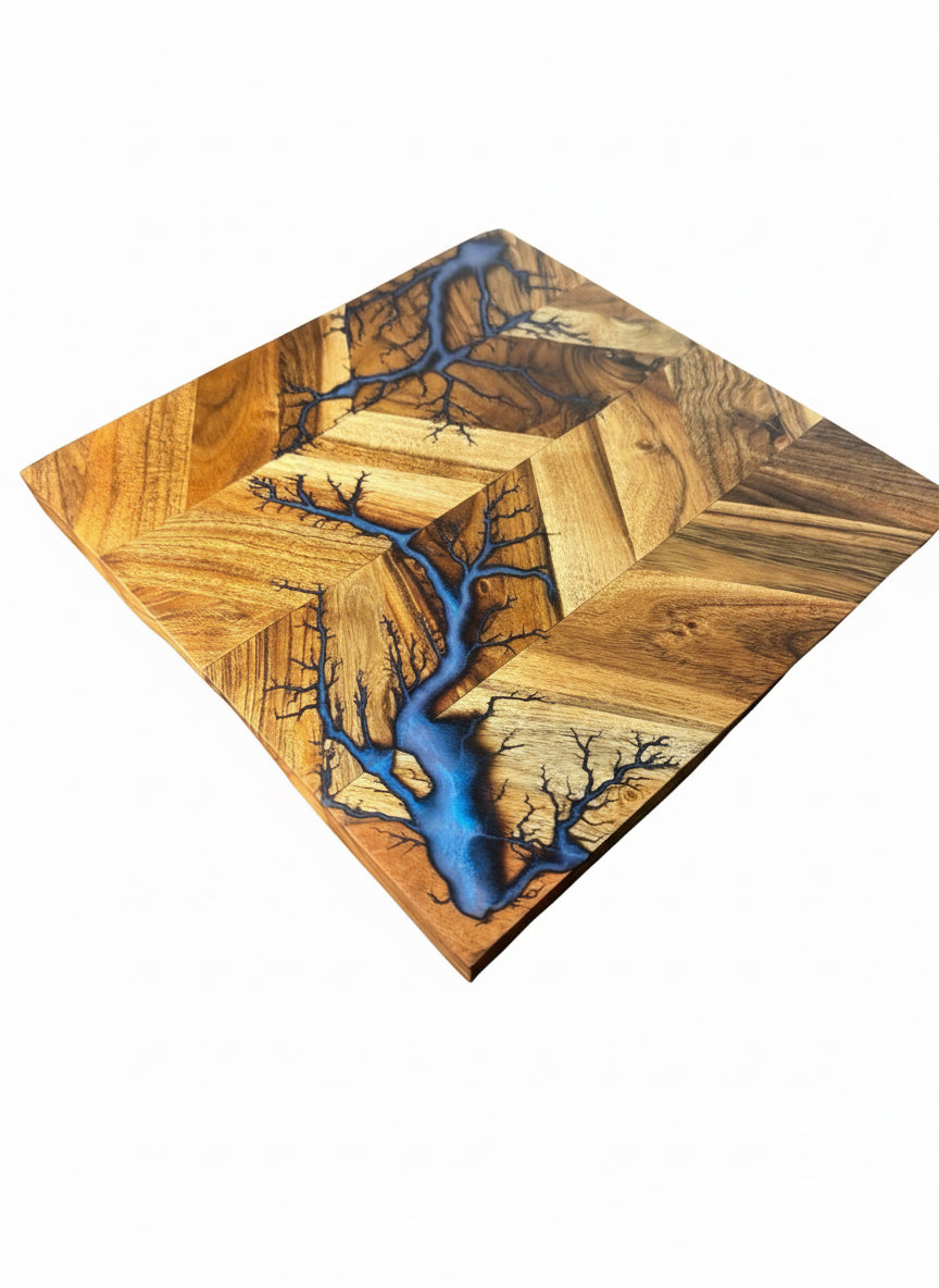 Handcrafted timber chopping board featuring bold resin accents. Australian-made by Fractal Flow Designs — durable, food-safe, and perfect as a luxury kitchen or housewarming gift