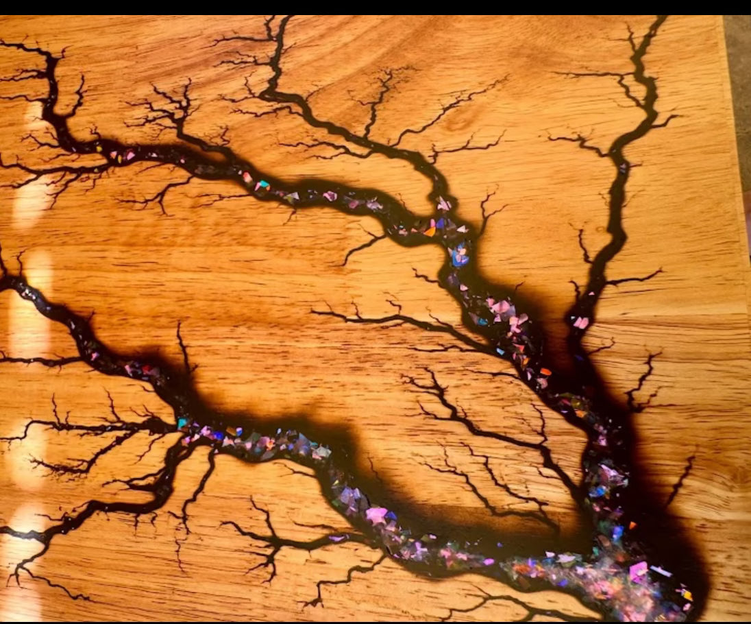 Resin boards Australia collection by Fractal Flow Designs – handcrafted timber serving, cheese, grazing, and charcuterie boards with bold resin art and fractal burning. Premium Australian-made gifts for weddings, birthdays, and housewarmings.
