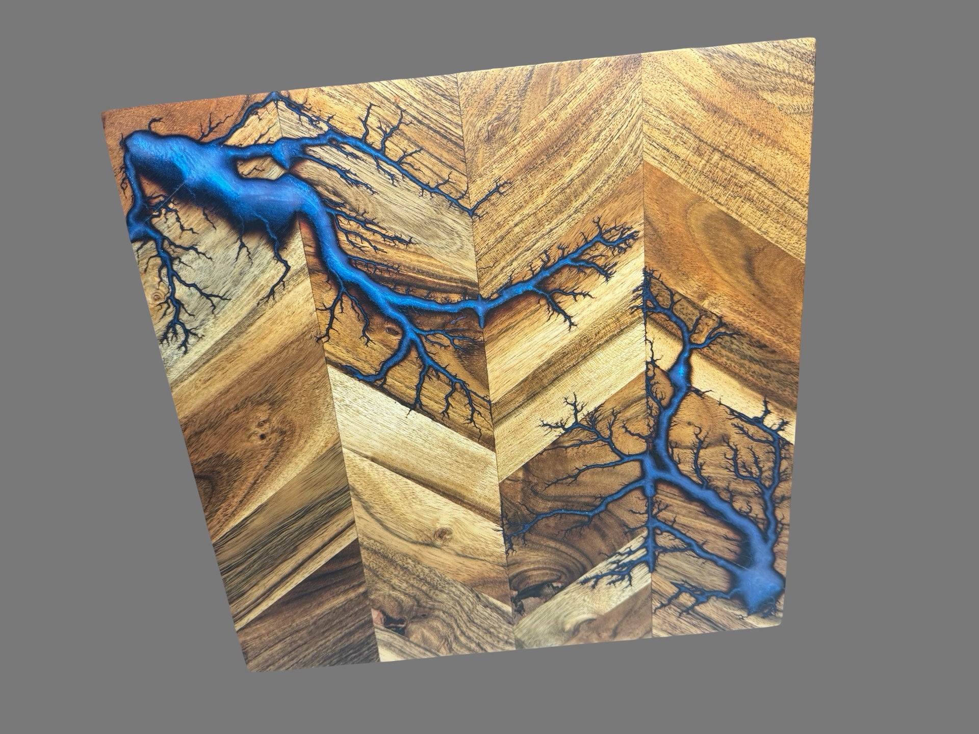 Premium Australian resin chopping board handcrafted in Bairnsdale, Victoria by Fractal Flow Designs. Made from sustainable timber with food-safe resin detailing — ideal for kitchen prep, display, or gifting across Australia.