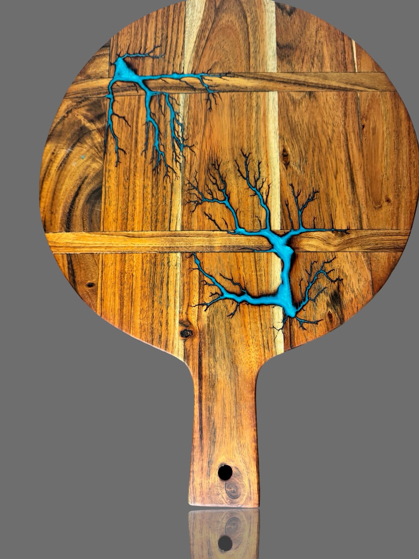 Artisan resin cheese board handcrafted in East Gippsland by Fractal Flow Designs. Combines Australian hardwood and glossy resin finish for elegant dining presentation.