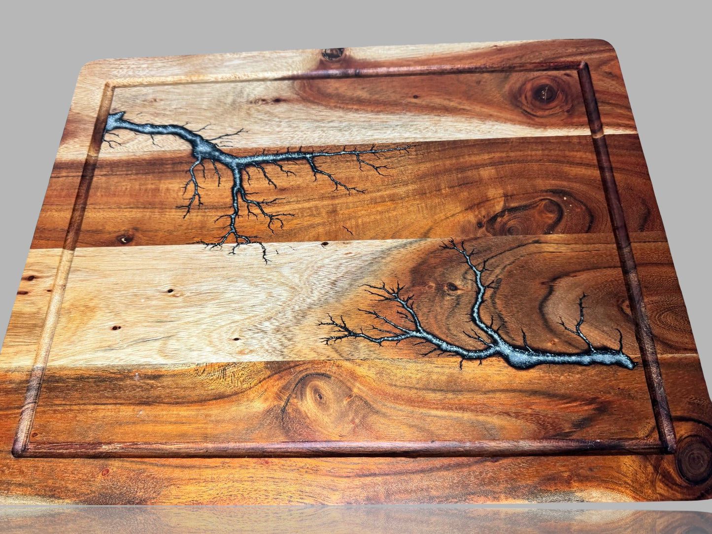 Timber and resin chopping board handmade by Fractal Flow Designs in Victoria — functional art for modern kitchen