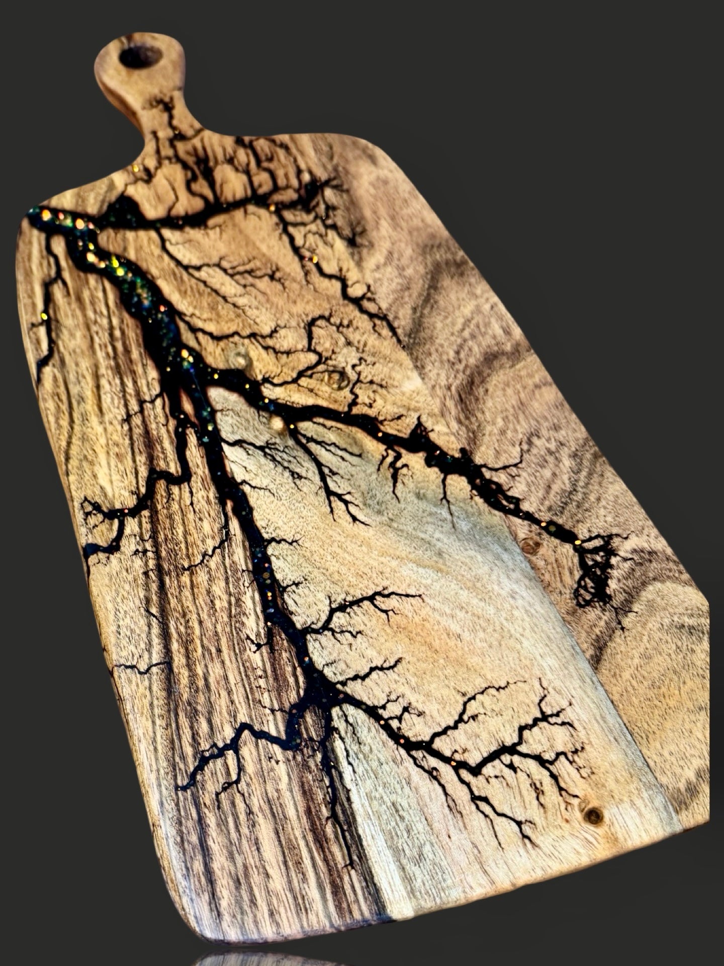 Fractal Flow Designs resin cheese paddle board handcrafted in Bairnsdale, Victoria. Australian-made grazing platter ideal for gourmet entertaining, weddings, and special gift occasions.