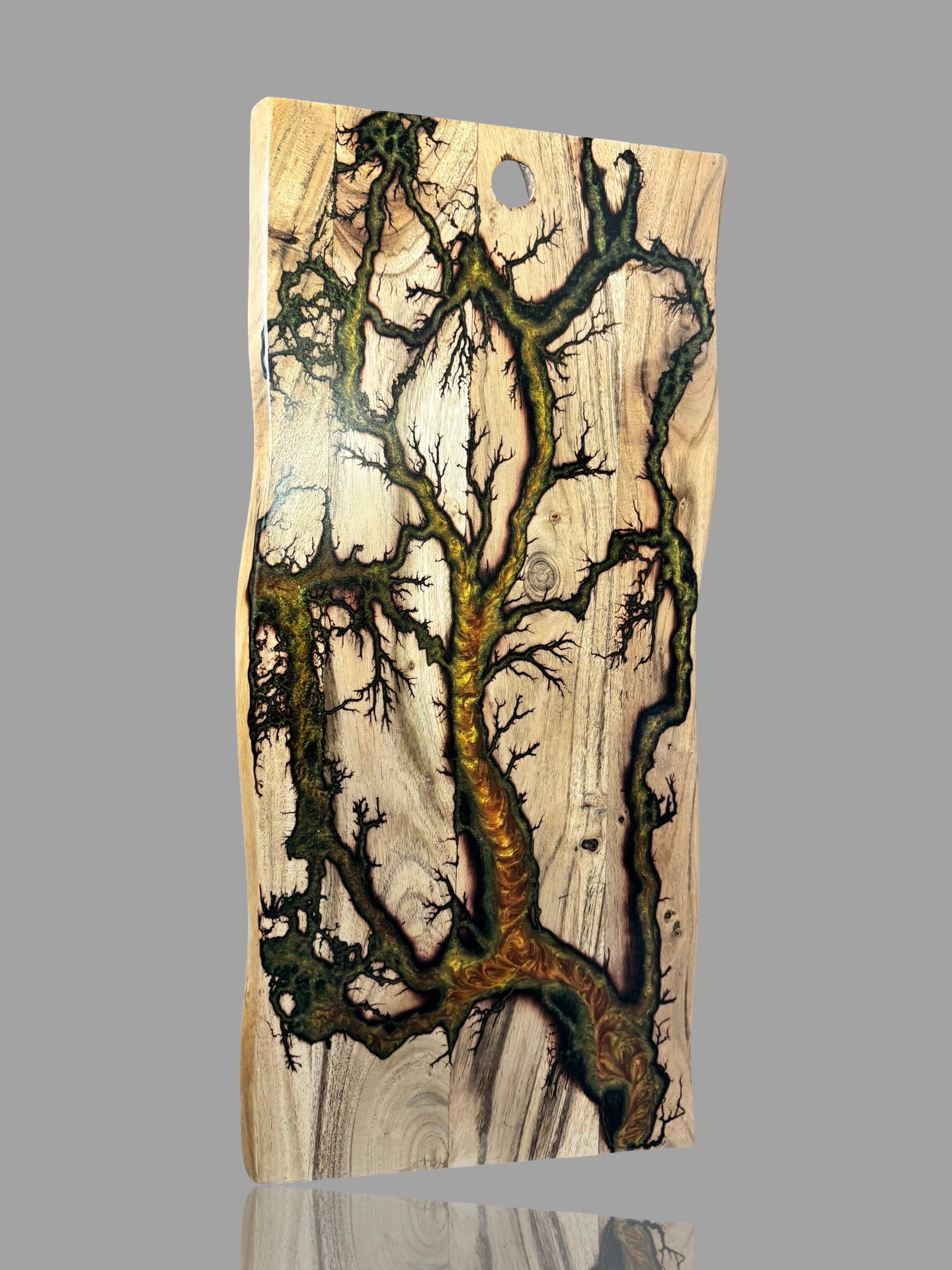 Front view of gold green red chameleon resin live edge charcuterie board handcrafted in East Gippsland by Fractal Flow Designs featuring fractal burning art sustainable Australian timber and food safe resin finish