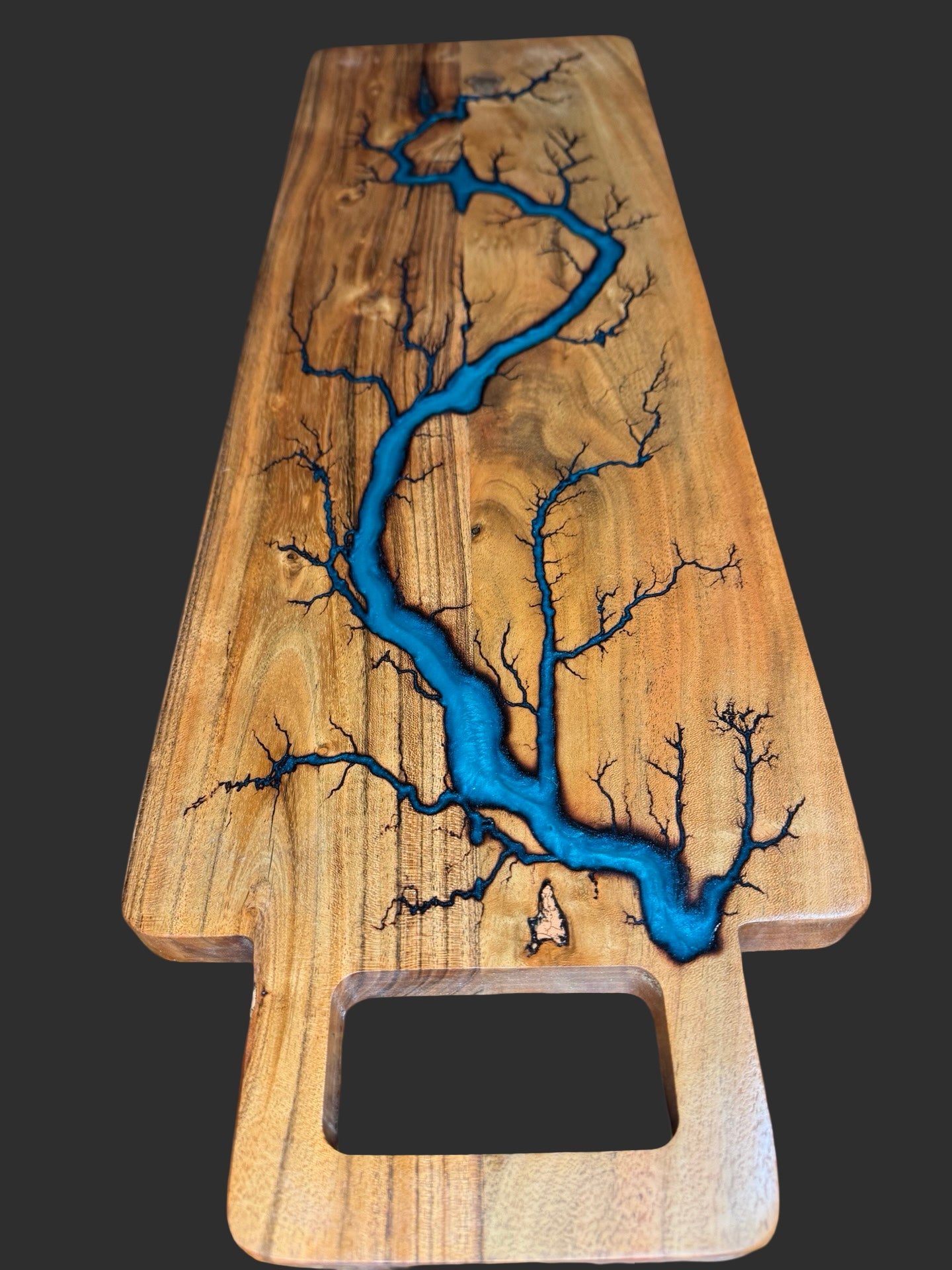 Fractal Flow Designs charcuterie board – handcrafted from premium Australian hardwood with striking resin inlays and fractal burning. A luxury artisan serving platter for cheese, grazing, and entertaining. Perfect Australian-made gift for weddings, anniversaries, birthdays, housewarmings, and corporate events. Unique timber resin board, made in Bairnsdale Victoria