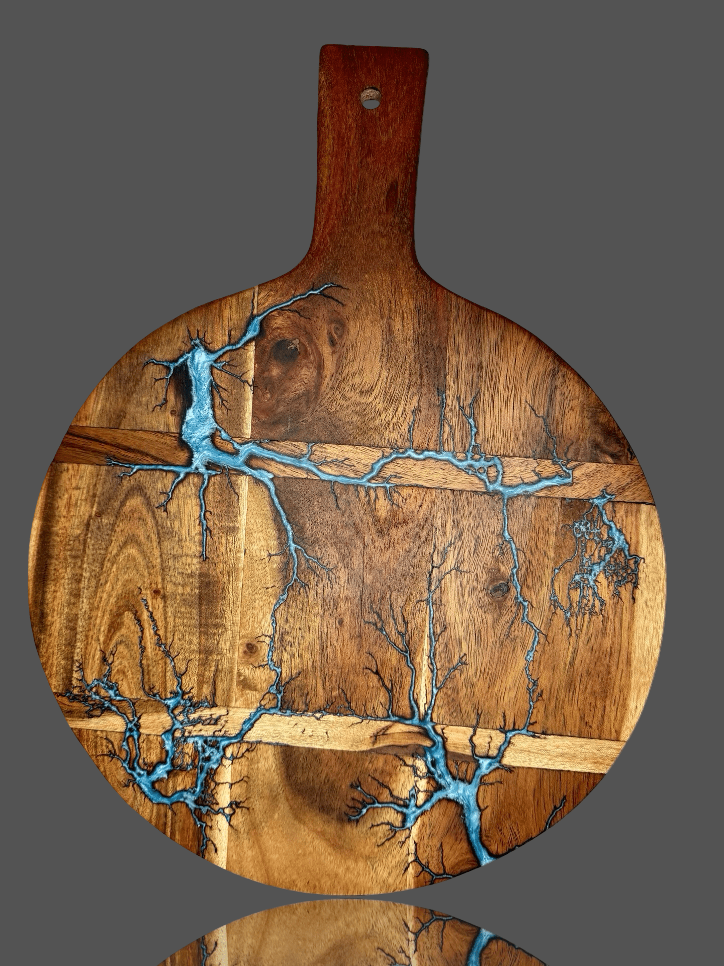 One-of-a-kind round resin paddle board – handmade cheese and grazing platter crafted in Bairnsdale, Victoria – premium Australian resin boards for weddings, anniversaries, and housewarming gifts.
