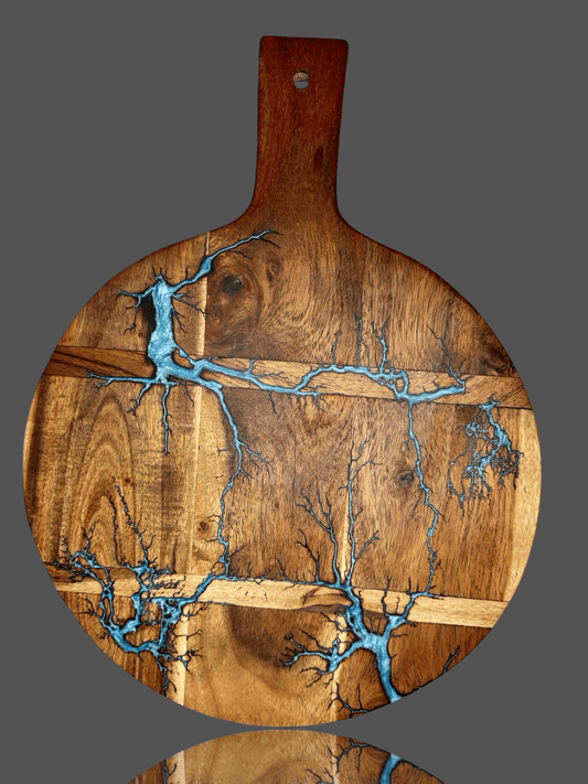 One-of-a-kind round resin paddle board – handmade cheese and grazing platter crafted in Bairnsdale, Victoria – premium Australian resin boards for weddings, anniversaries, and housewarming gifts.