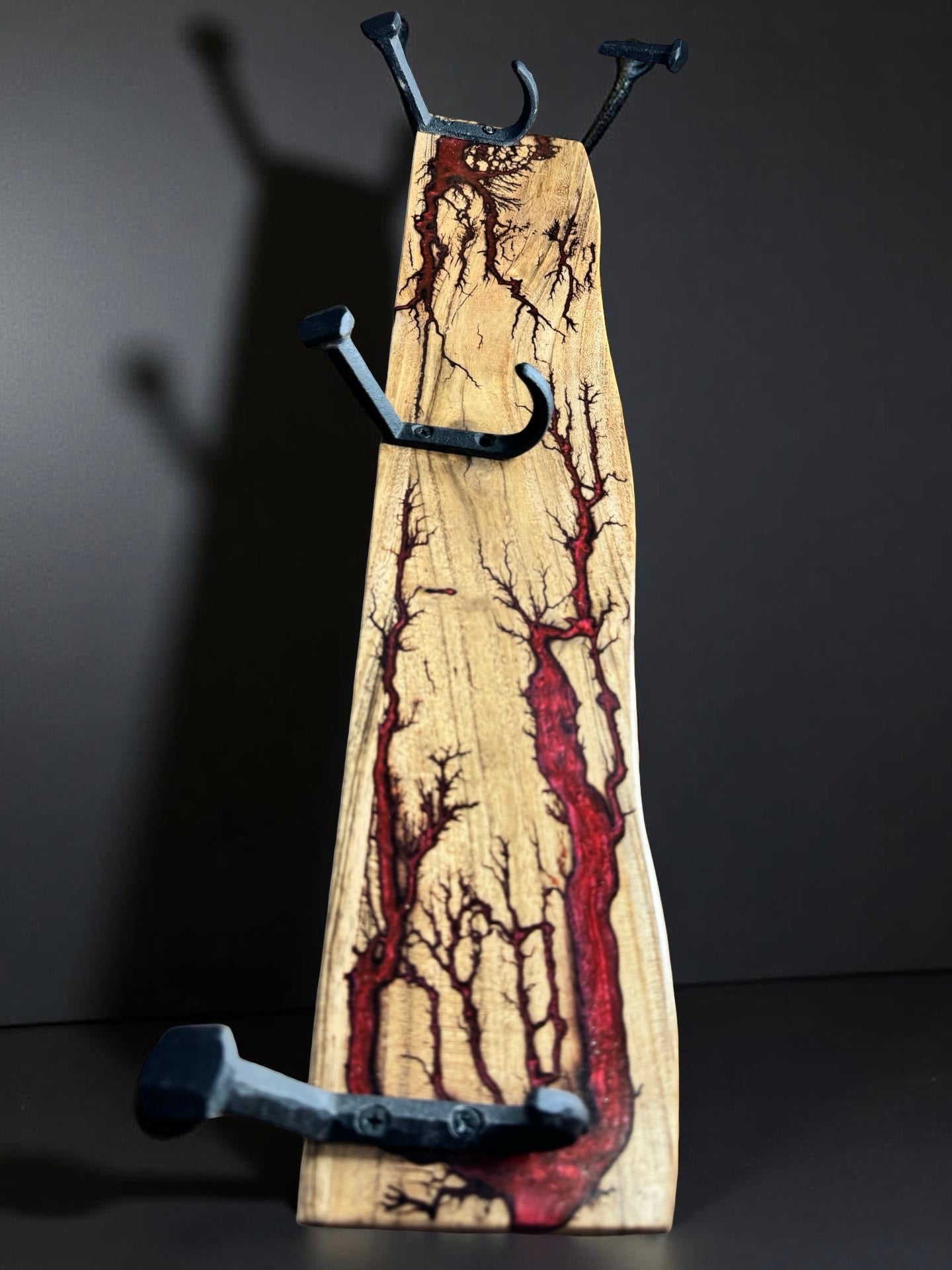 Red resin timber coat rack with bold electric finish, artisan made in Victoria