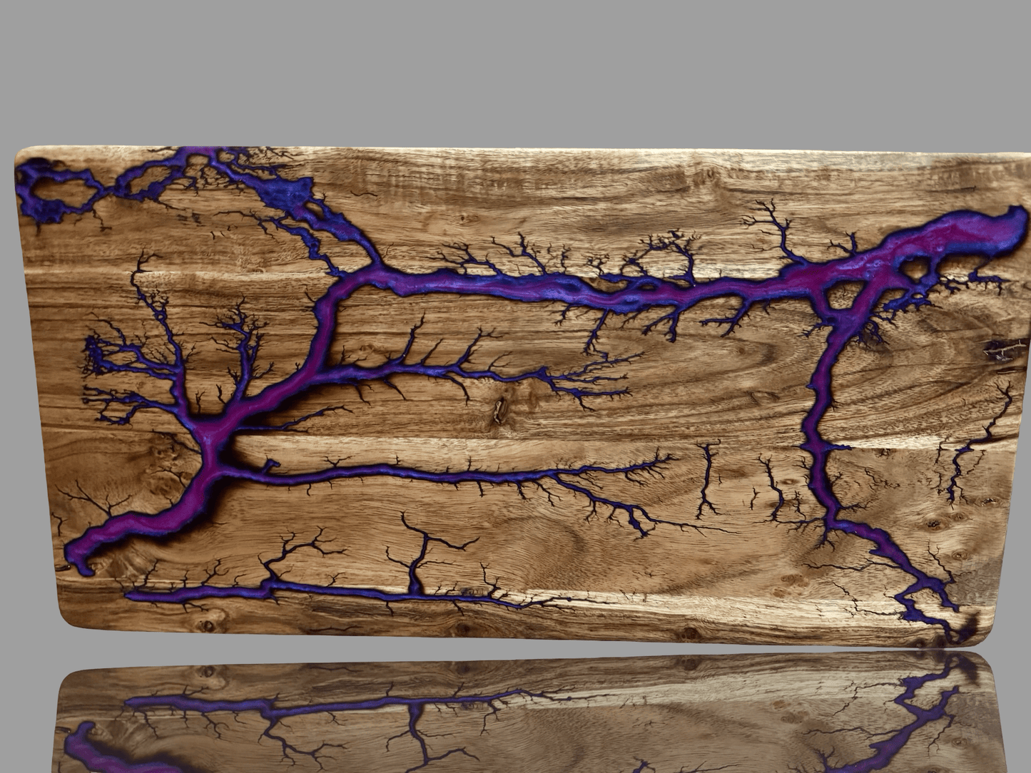 Resin timber serving board by Fractal Flow Designs. Australian-made hardwood with bold resin accents and fractal burning, ideal for cheese boards, grazing platters, charcuterie spreads, or as a premium wedding and housewarming gift