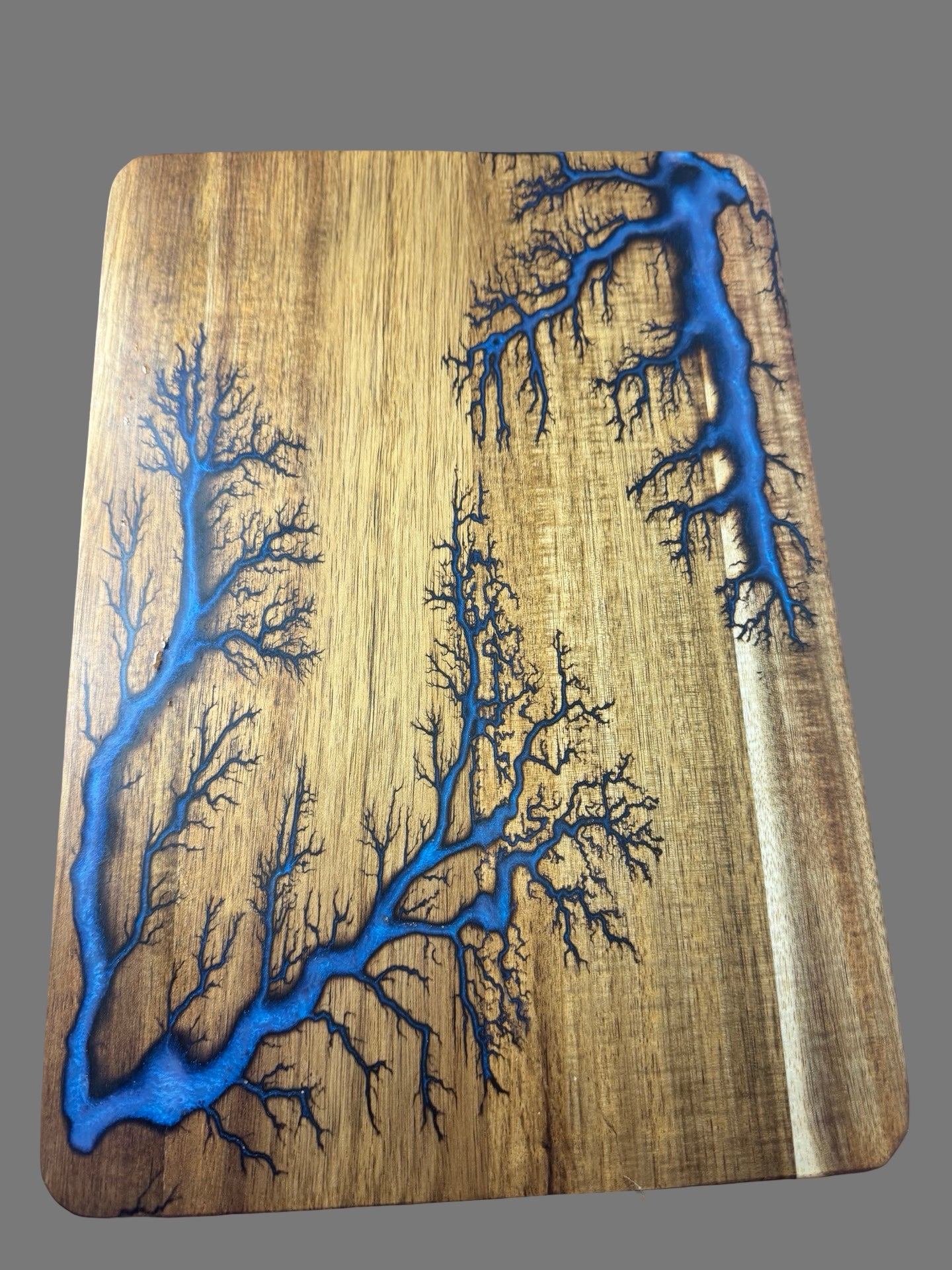 Handmade acacia wood resin chopping board from Bairnsdale, Victoria. Australian-made by Fractal Flow Designs with unique resin design and artisan craftsmanship