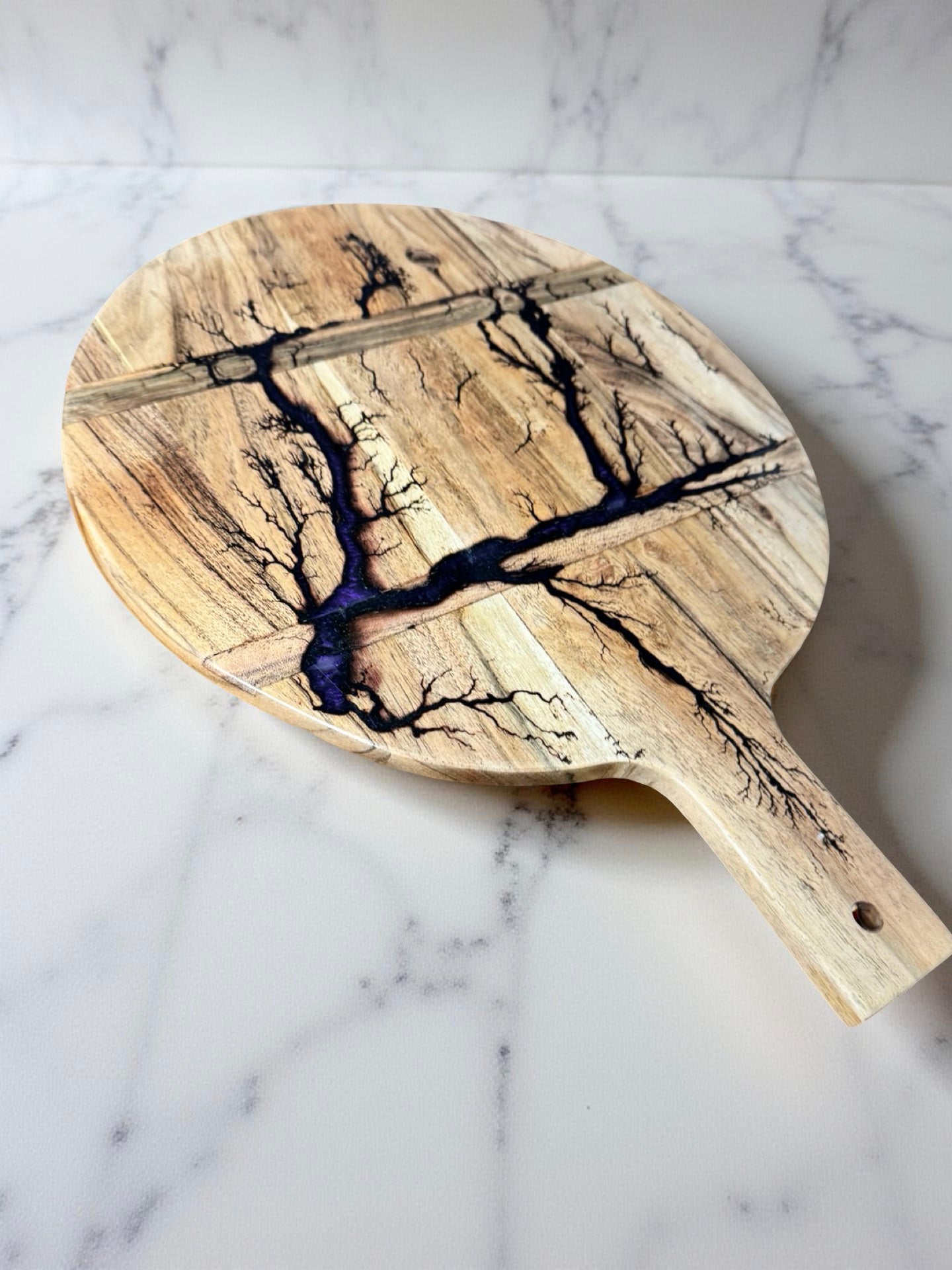Purple resin round cheese board resin boards Australia acacia paddle featuring fractal burn detail