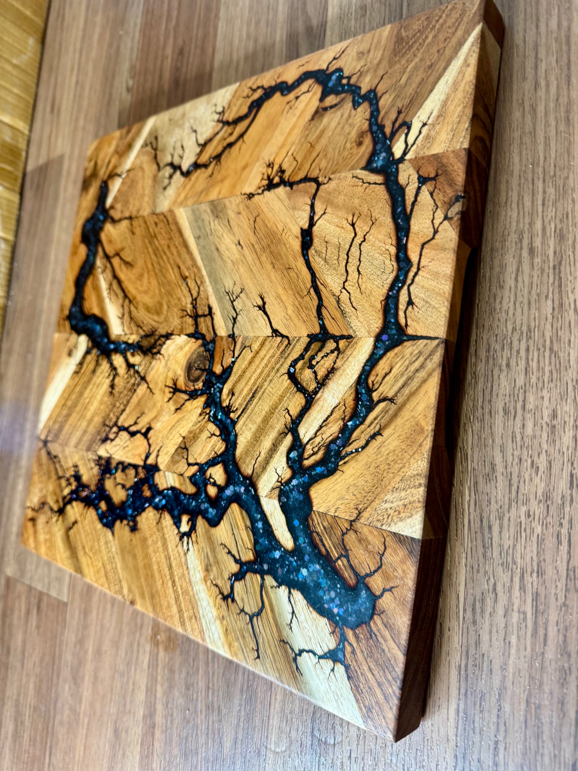 Fractal Flow Designs resin chopping board handcrafted in Bairnsdale, Victoria. Australian-made timber board with resin art, perfect for charcuterie, cheese, and gift occasions.