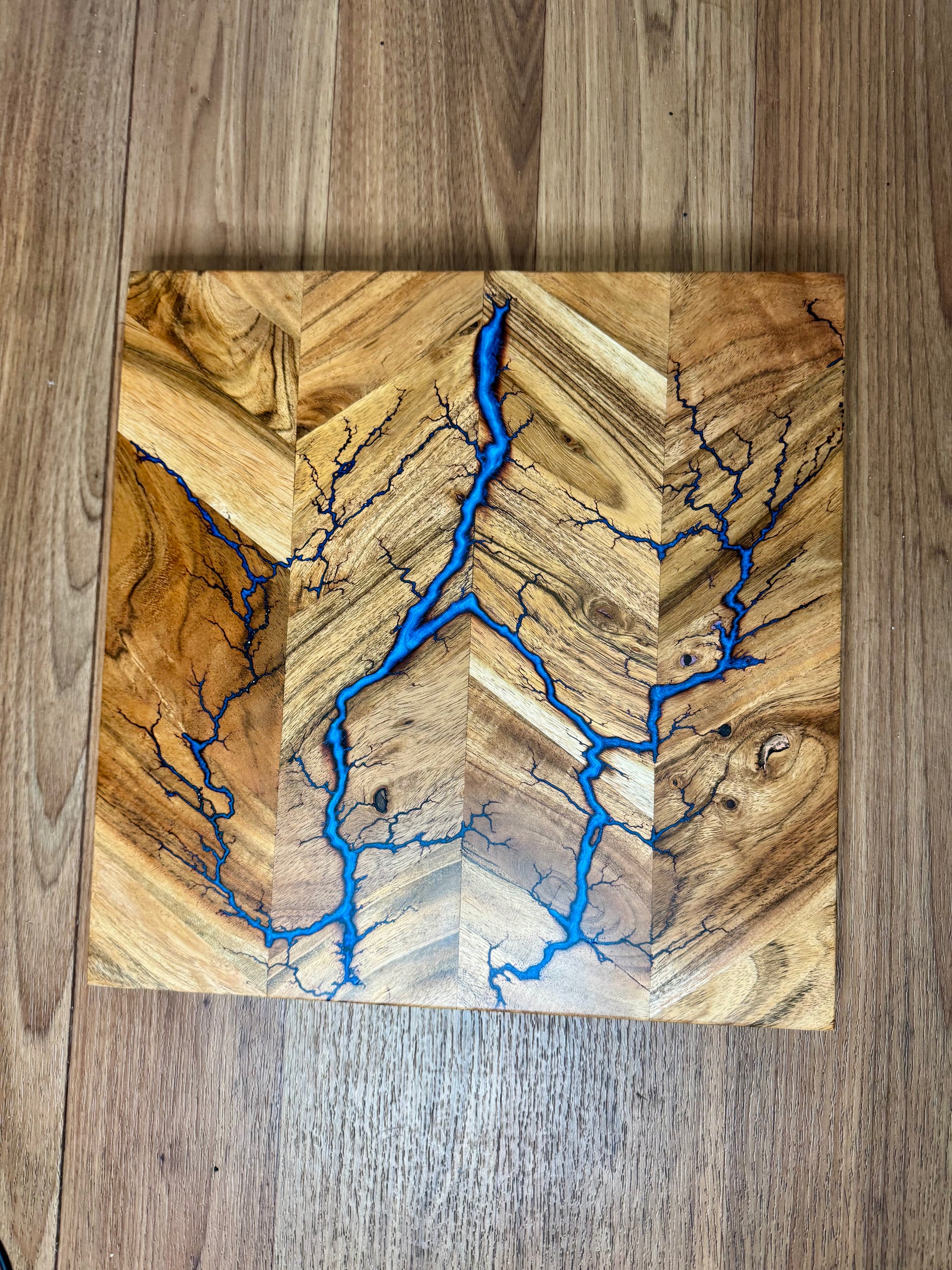 Fractal Flow Designs premium resin chopping board featuring fractal burning detail. Australian-made serving board ideal for charcuterie, cheese, and gourmet entertaining