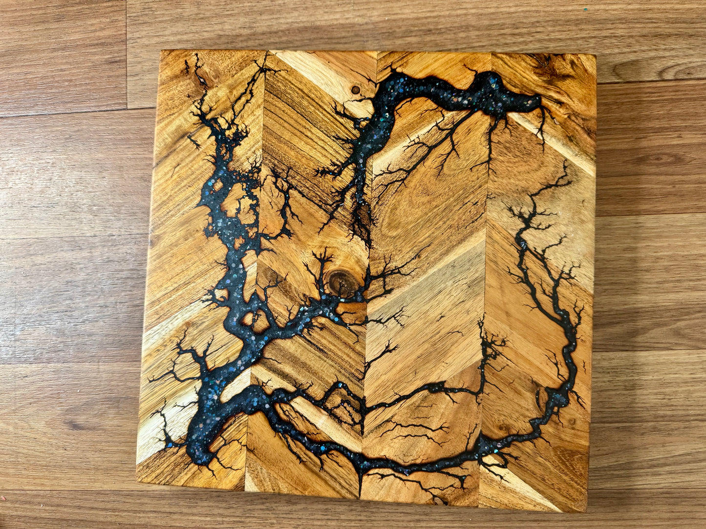 Premium resin chopping board made from sustainable Australian hardwood. Handmade by Fractal Flow Designs, ideal for grazing platters, corporate gifts, and gourmet kitchens.