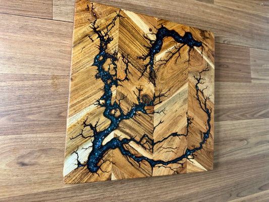 Artisan resin chopping board with unique fractal detail, handmade in Bairnsdale, Victoria. Australian-made platter perfect for charcuterie, grazing, and home entertaining styles 