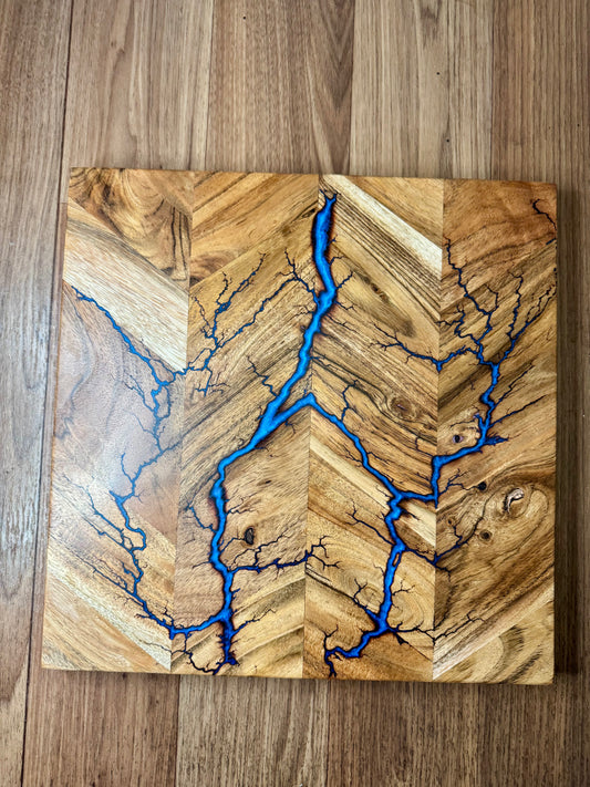 Quality resin chopping board made in Australia by Fractal Flow Designs. Unique timber and resin platter ideal for charcuterie, grazing spreads, weddings, and gourmet cooking.