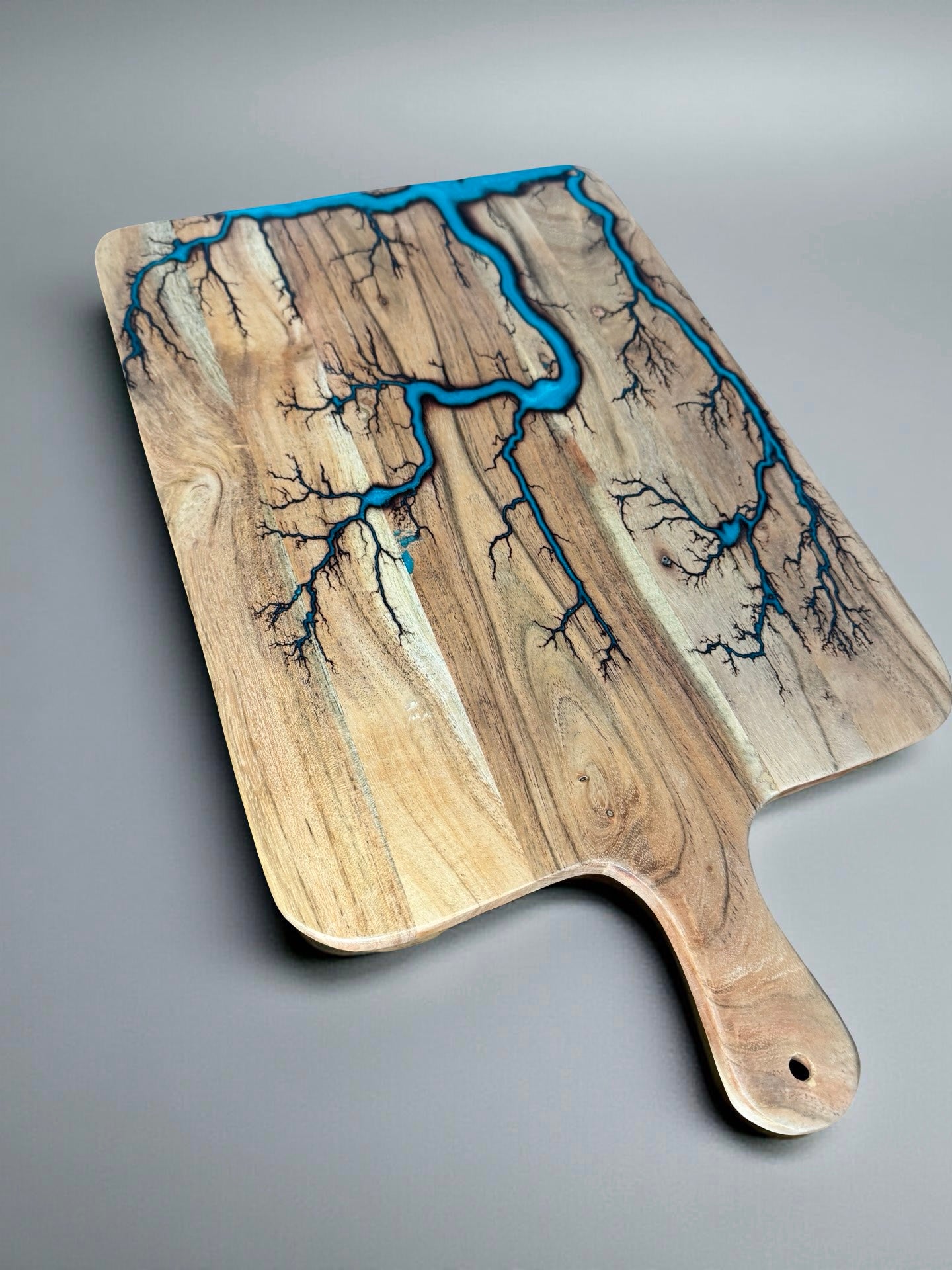 Handcrafted large lagoon blue resin cheese paddle resin boards Australia artisan fractal burn finish