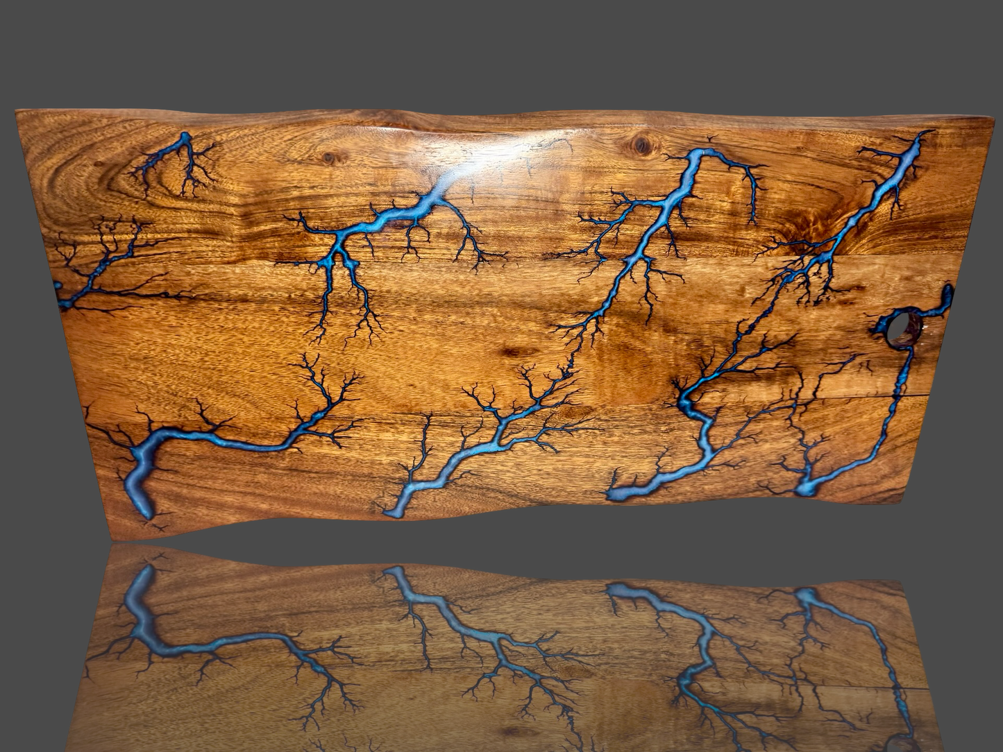 Fractal burning live edge resin charcuterie board – premium Australian-made timber gift board. Perfect for cheese platters, grazing spreads, and special occasions. Ships Australia-wide.