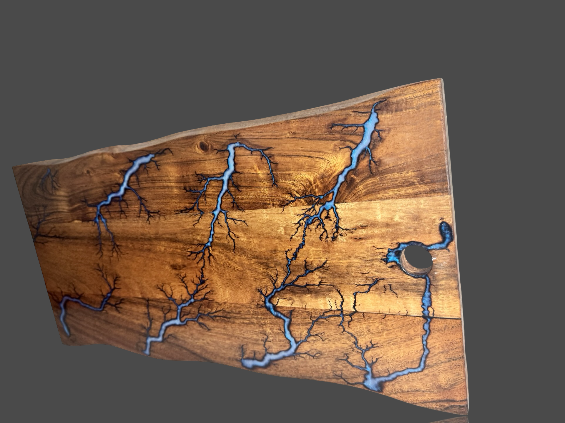 Handcrafted live edge resin serving board with bold fractal burning, ideal for charcuterie, cheese, and grazing. Unique gift for weddings, anniversaries, and housewarmings. Australian-made, premium timber art piece.