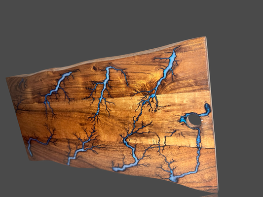 Handcrafted live edge resin serving board with bold fractal burning, ideal for charcuterie, cheese, and grazing. Unique gift for weddings, anniversaries, and housewarmings. Australian-made, premium timber art piece.