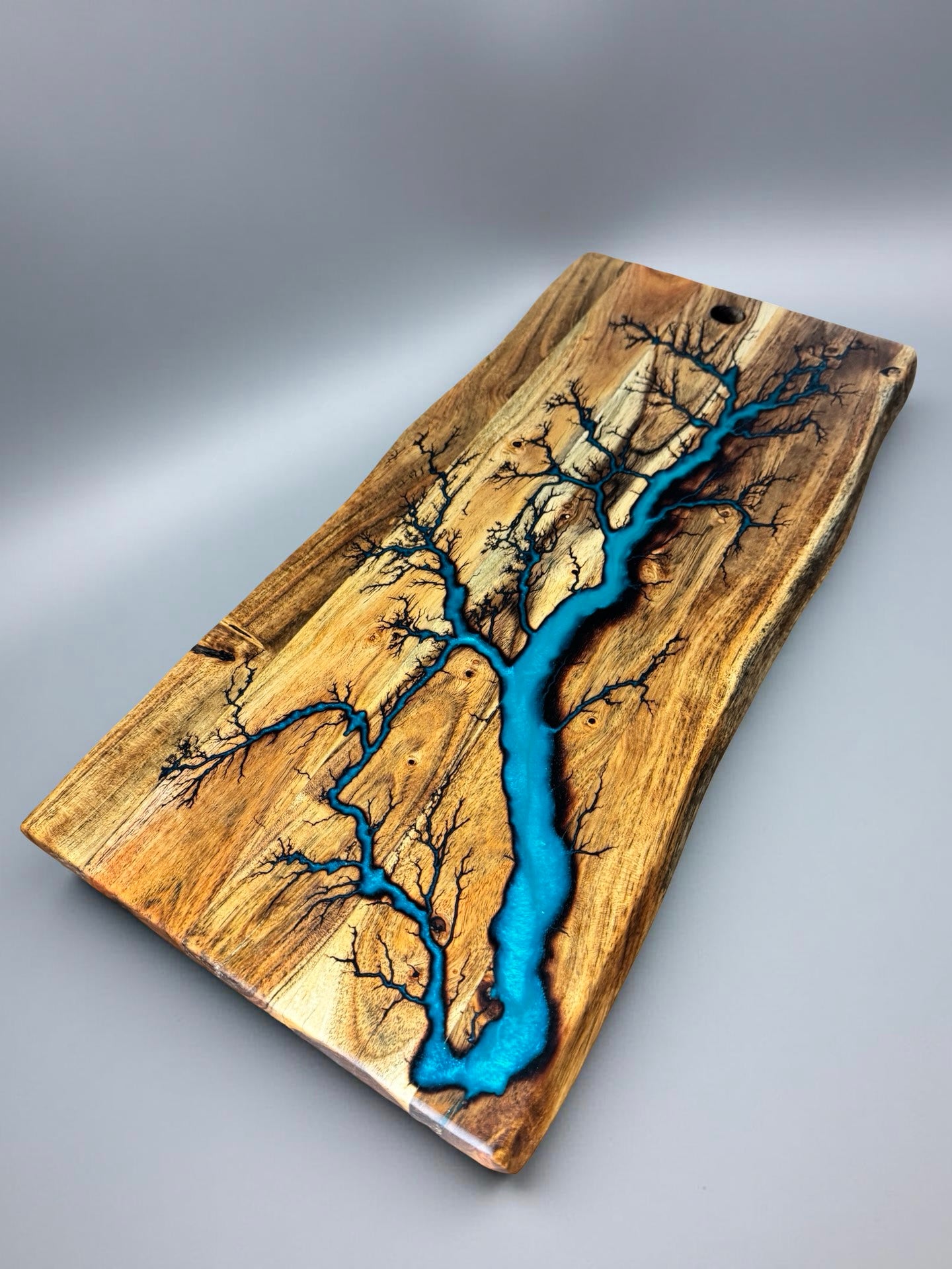 Live edge board with marine green resin artwork, artisan Australian made serving piece