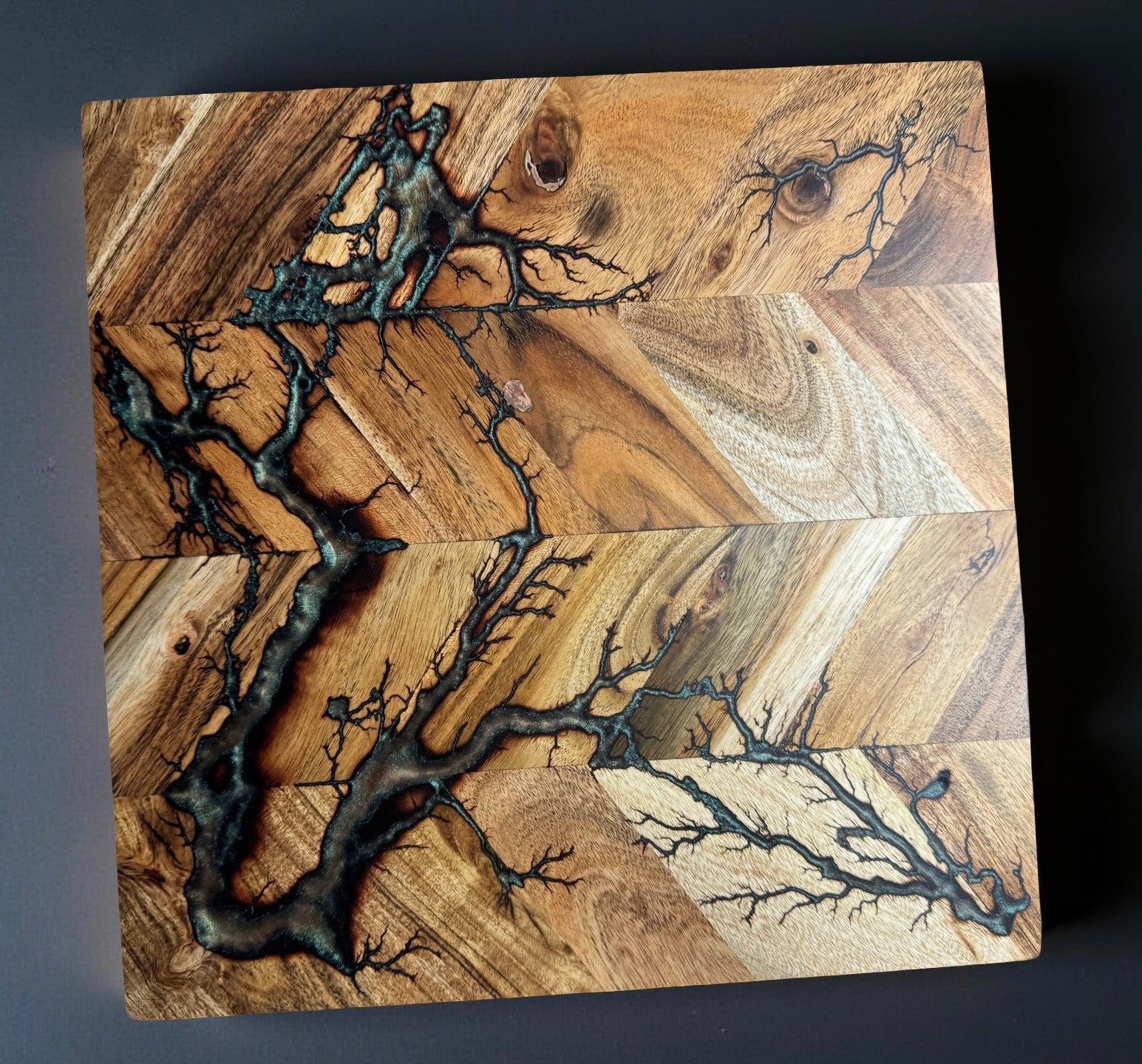 320 x 320 red green chameleon resin chopping board with fractal burning art crafted from Australian acacia made in Bairnsdale Australia by Fractal Flow Designs Australia’s resin board brand