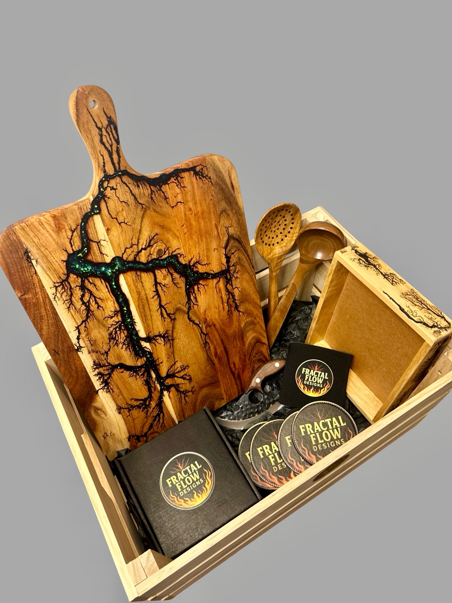 Artisan resin boards Australia premium hamper, including grazing paddle, forged meat cleaver, coasters, bottle opener, and care kit