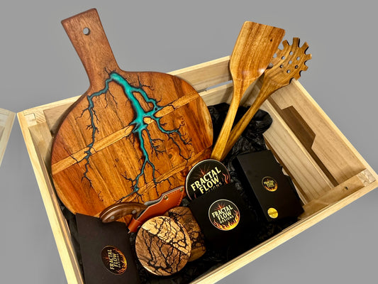 Deluxe resin cheese board gift box with forged knives, teak wood utensils, coasters, and stubby holder by Fractal Flow Designs, handmade in Bairnsdale Victoria.