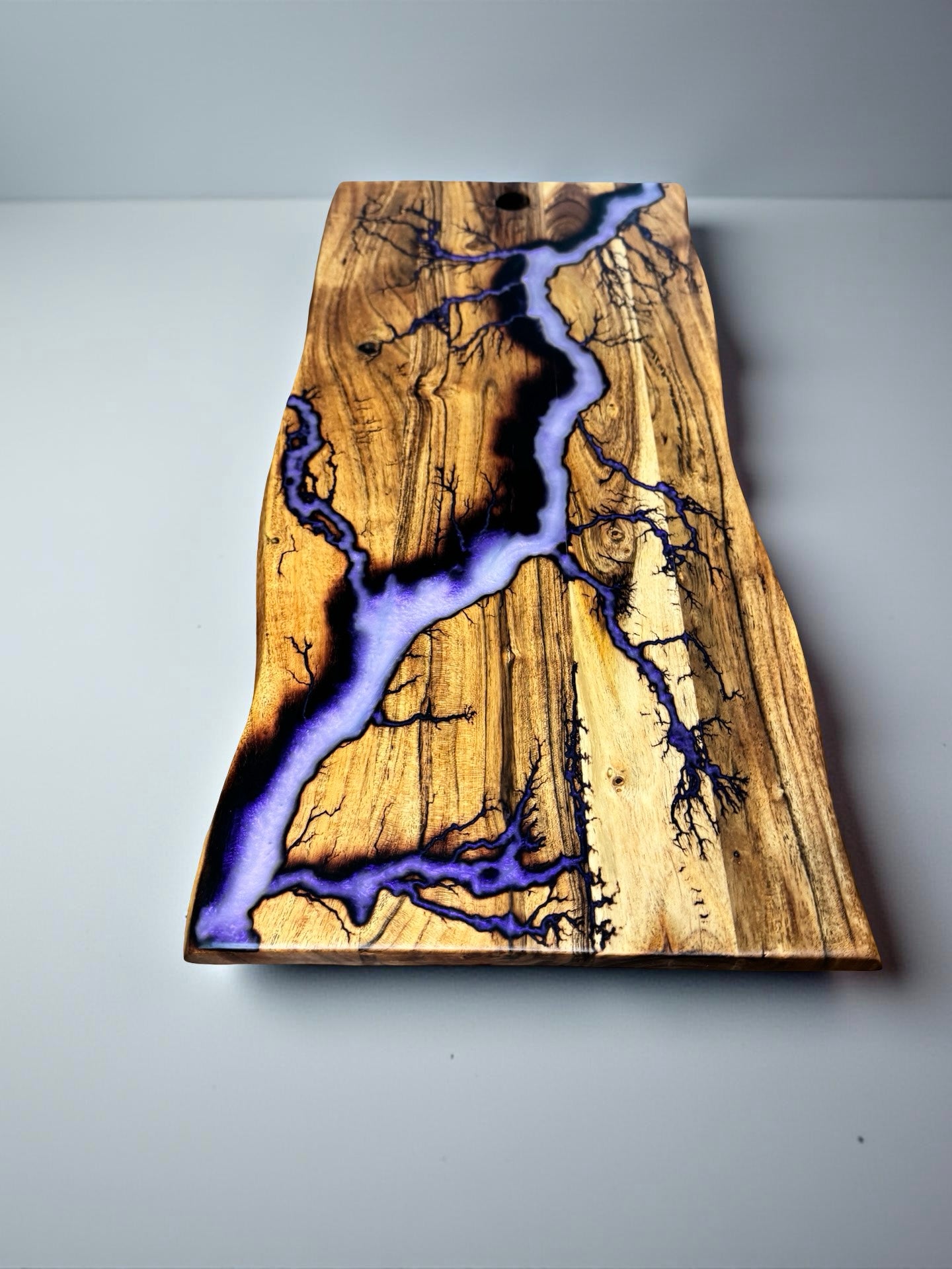 Live edge serving board with iridescent purple resin and electric lightning burn pattern, Fractal Flow Designs