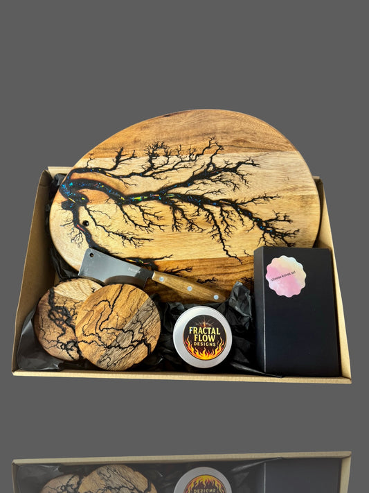 Luxury Cheese Lovers Gift Box handmade by Fractal Flow Designs in Bairnsdale, Australia. Includes resin board, cheese knife, timber coasters, and board care kit. Ships Australia-wide, ideal for housewarming gifts, weddings, and special occasions.