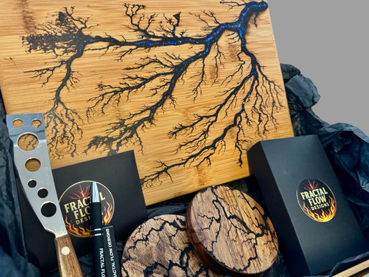 Cheese Lovers Gift Box by Fractal Flow Designs featuring a handcrafted resin cheese board with premium timber, care kit, and gift wrapping. Made in Bairnsdale, Victoria and shipped Australia-wide, perfect for weddings, birthdays, and gourmet entertaining