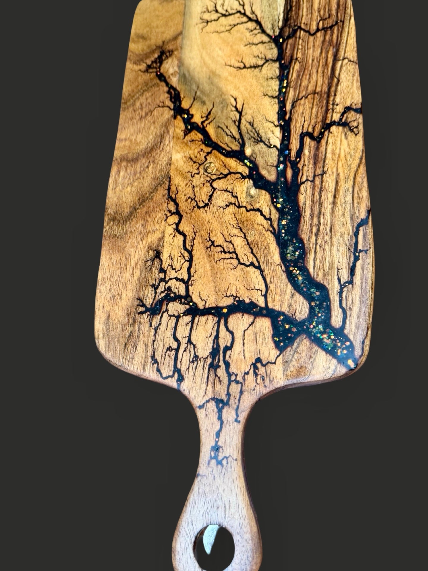 Special resin paddle cheese board by Fractal Flow Designs. Crafted in Victoria, Australia from sustainable timber, perfect for grazing platters and luxury home gifting.