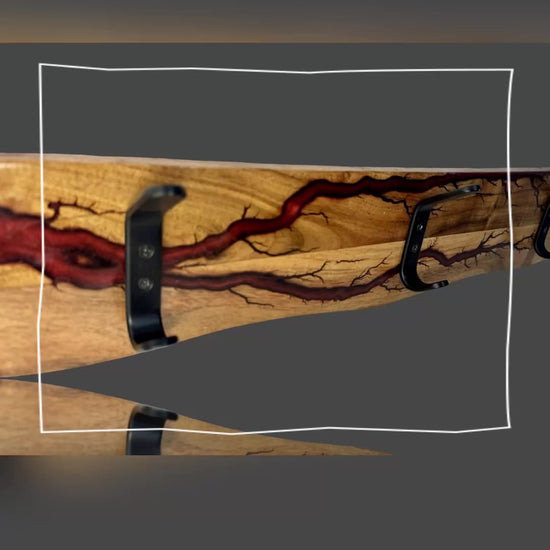 Red timber coat rack with resin inlay – handcrafted by Fractal Flow Designs in Bairnsdale, Victoria. Bold wall decor with Aussie-made design