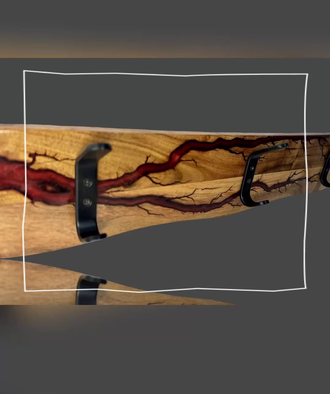Red timber coat rack with resin inlay – handcrafted by Fractal Flow Designs in Bairnsdale, Victoria. Bold wall decor with Aussie-made design