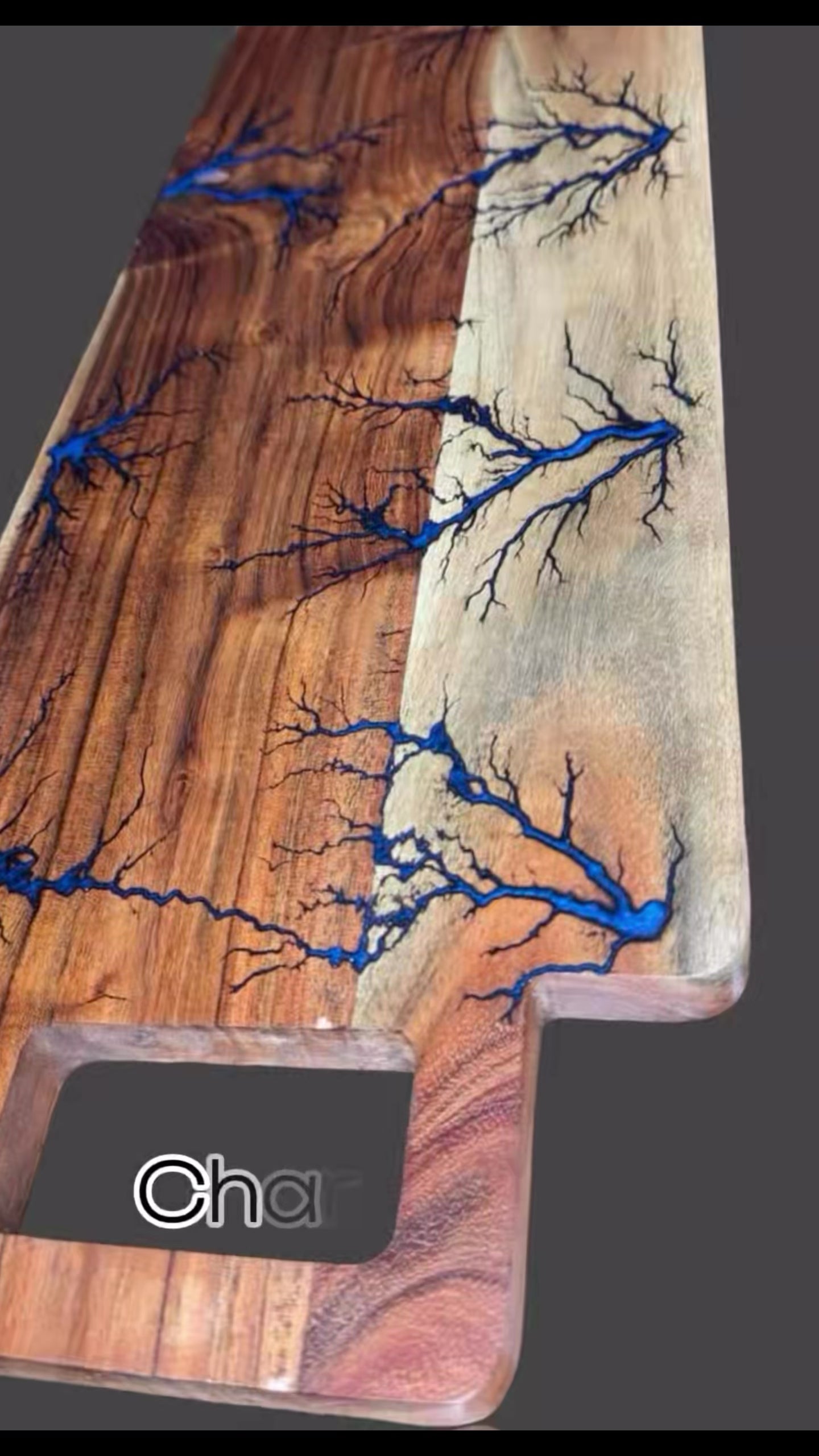 Fractal Flow Designs charcuterie board – handcrafted from premium Australian hardwood with striking resin inlays and fractal burning. A luxury artisan serving platter for cheese, grazing, and entertaining. Perfect Australian-made gift for weddings, anniversaries, birthdays, housewarmings, and corporate events. Unique timber resin board, made in Bairnsdale Victoria.