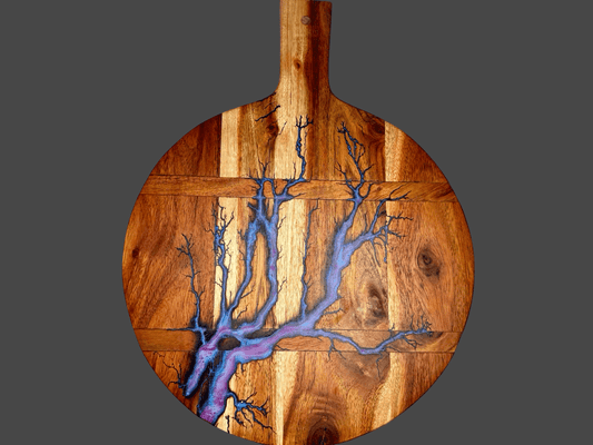 Premium round resin cheese paddle board handcrafted by Fractal Flow Designs in Bairnsdale, Victoria. Australian resin boards perfect for charcuterie, grazing, and gourmet entertaining.