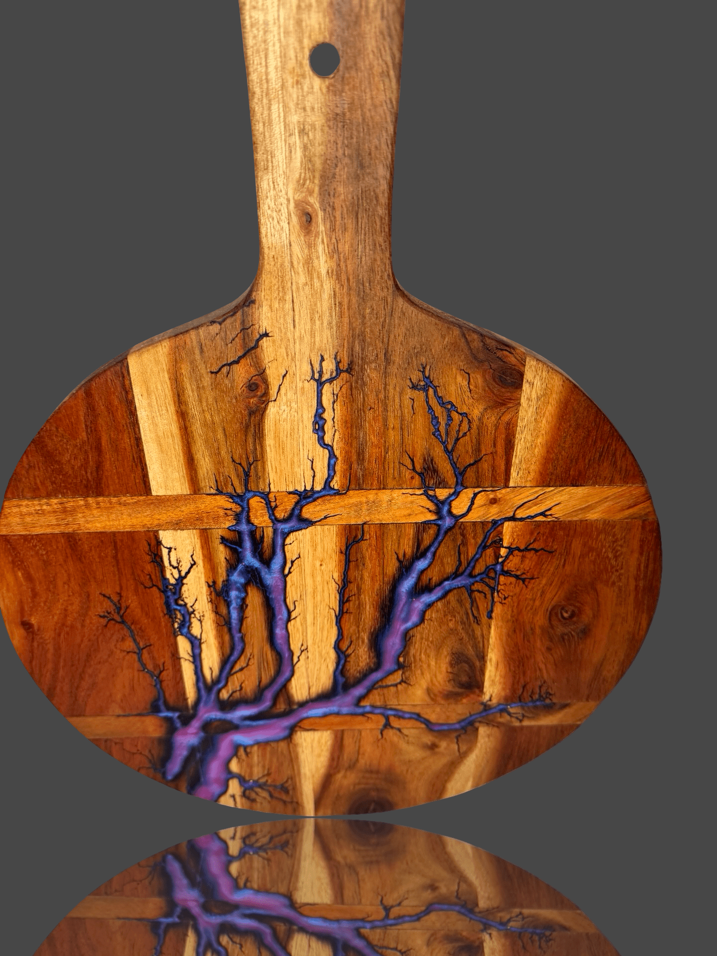 Fractal Flow Designs round resin cheese paddle serving board crafted from Australian timber. Premium Australian resin boards ideal for entertaining, charcuterie, and home gifting.