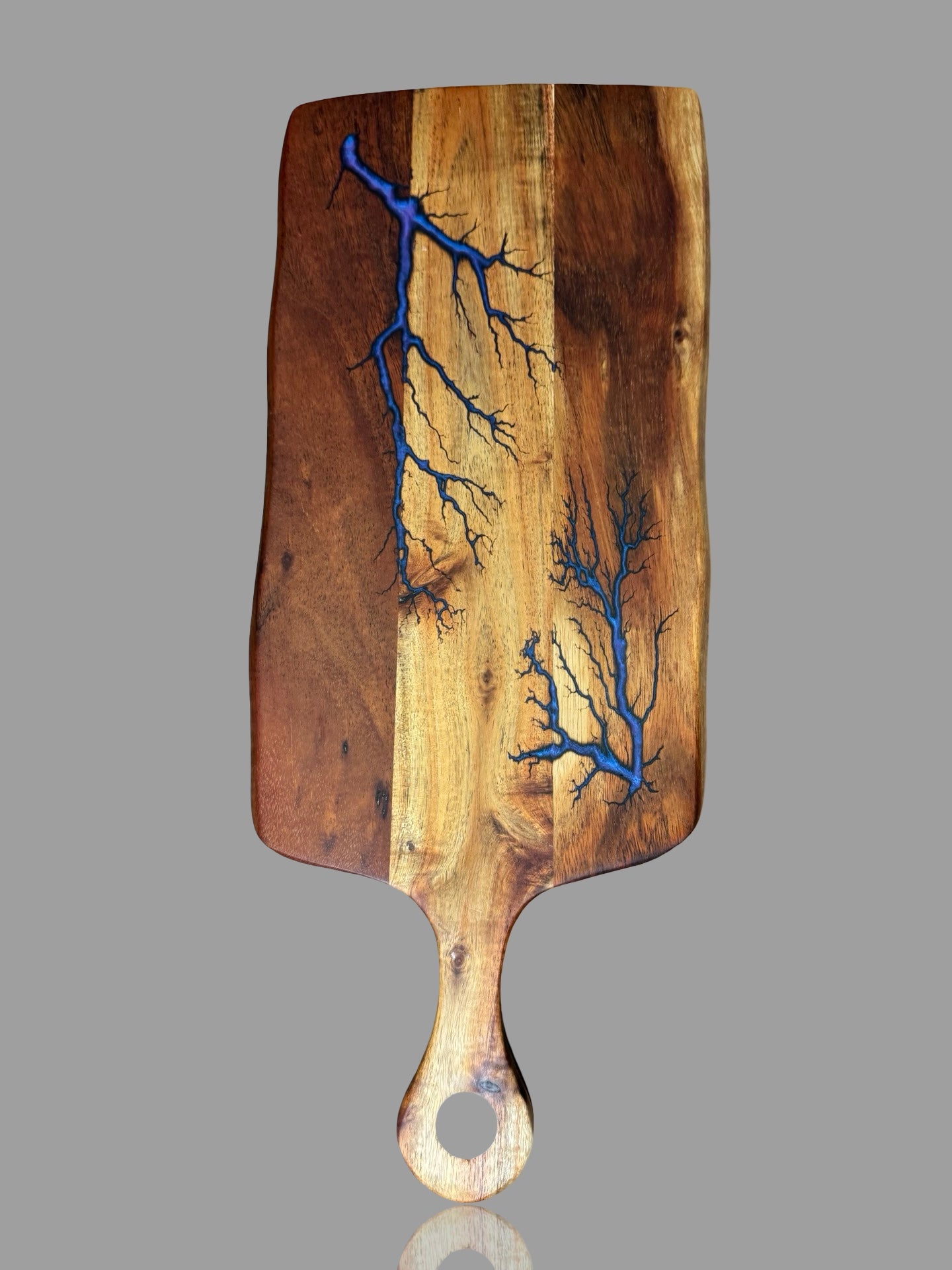 Luxury resin cheese paddle handcrafted by Fractal Flow Designs in Australia — premium resin artistry meets functional serving design.