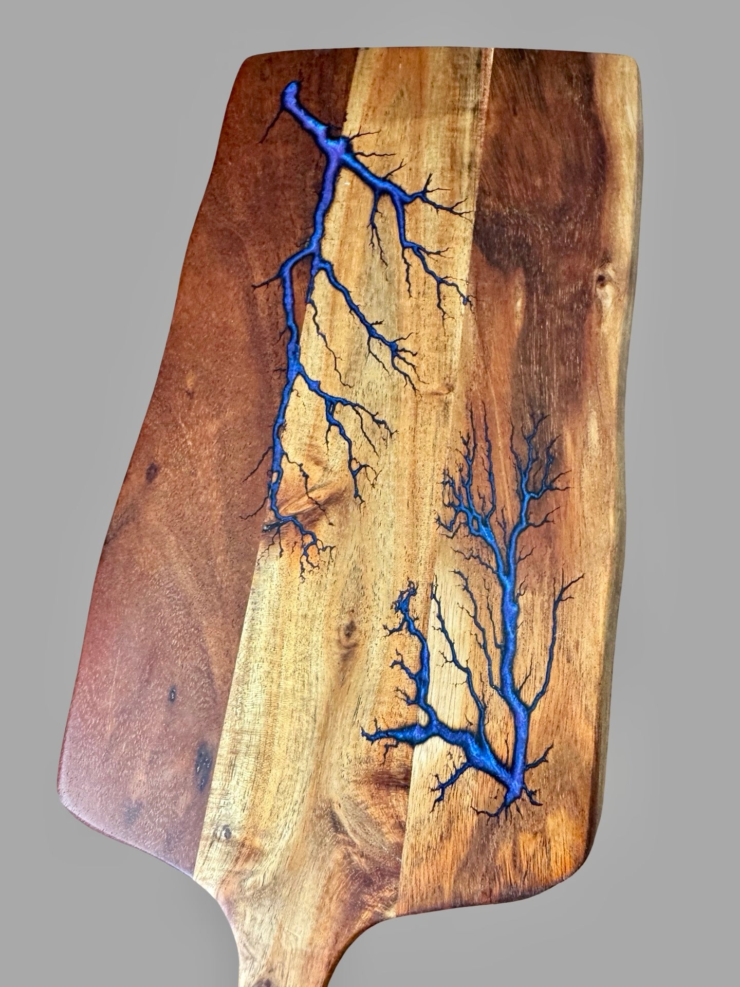Bespoke resin cheese paddle board handmade in Victoria by Fractal Flow Designs — stunning resin detail and hardwood finish.
