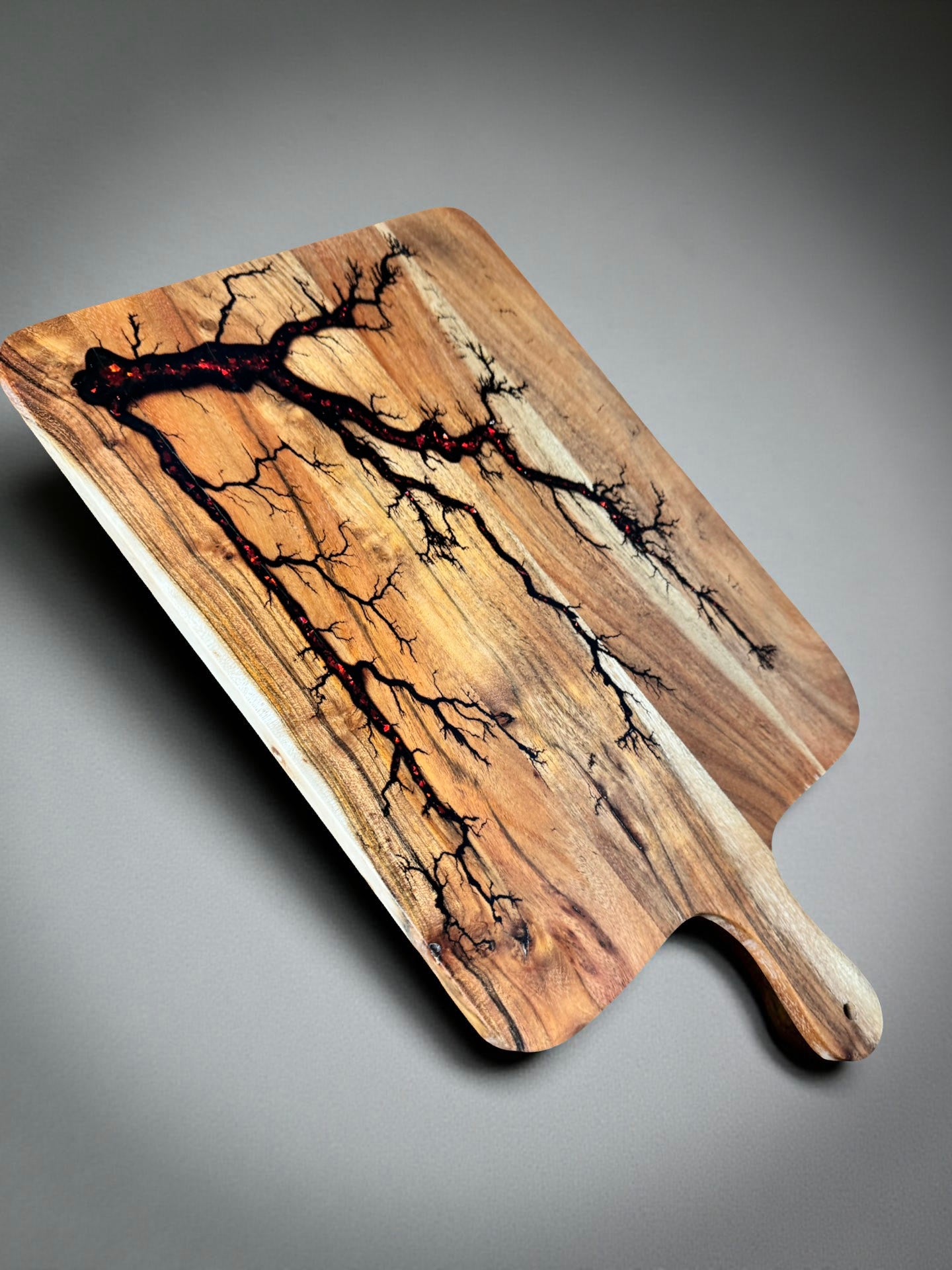 Red flash resin charcuterie paddle board handcrafted with lightning style fractal art Australia made