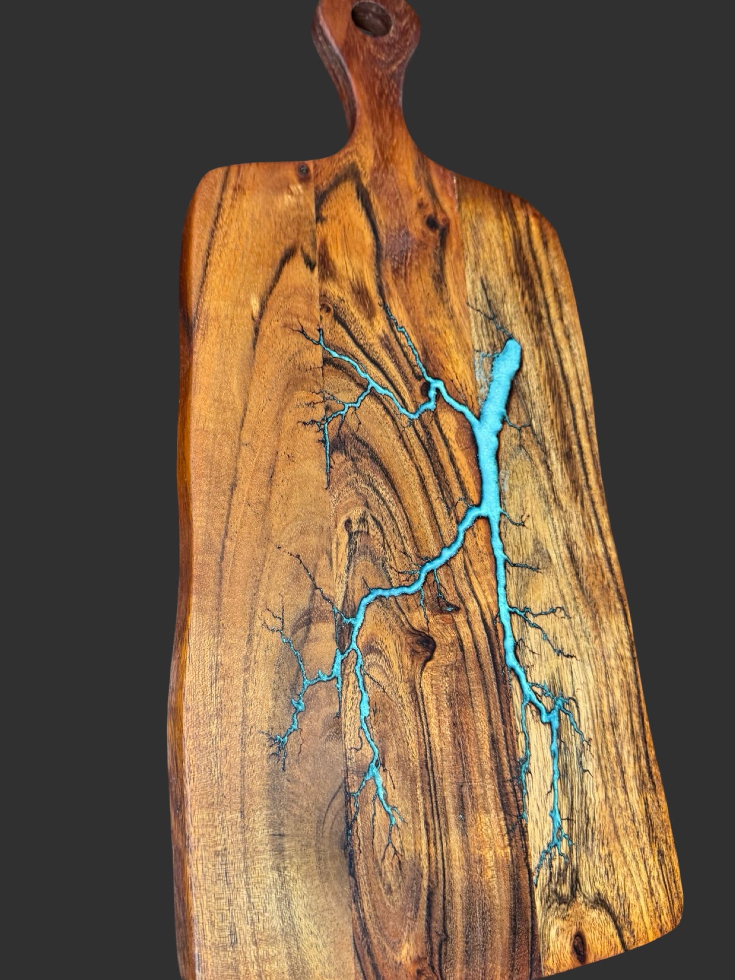 Resin cheese paddle board with unique fractal burning patterns. Handmade in Victoria, Australia by Fractal Flow Designs, ideal for weddings, housewarmings, and special gifts.
