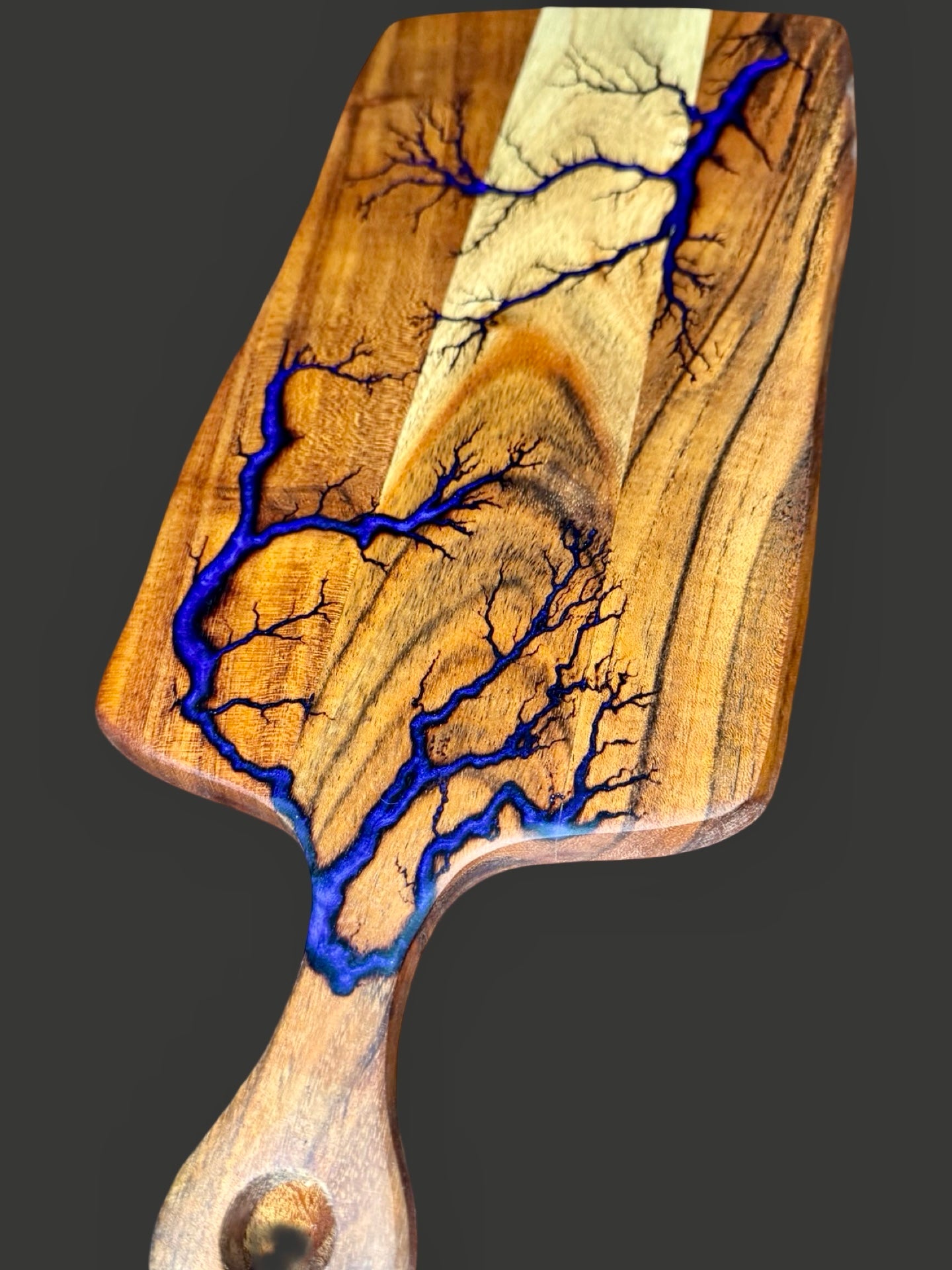 Australian resin paddle cheese board with unique fractal art. Handmade in Bairnsdale by Fractal Flow Designs, perfect grazing board for gourmet dining.