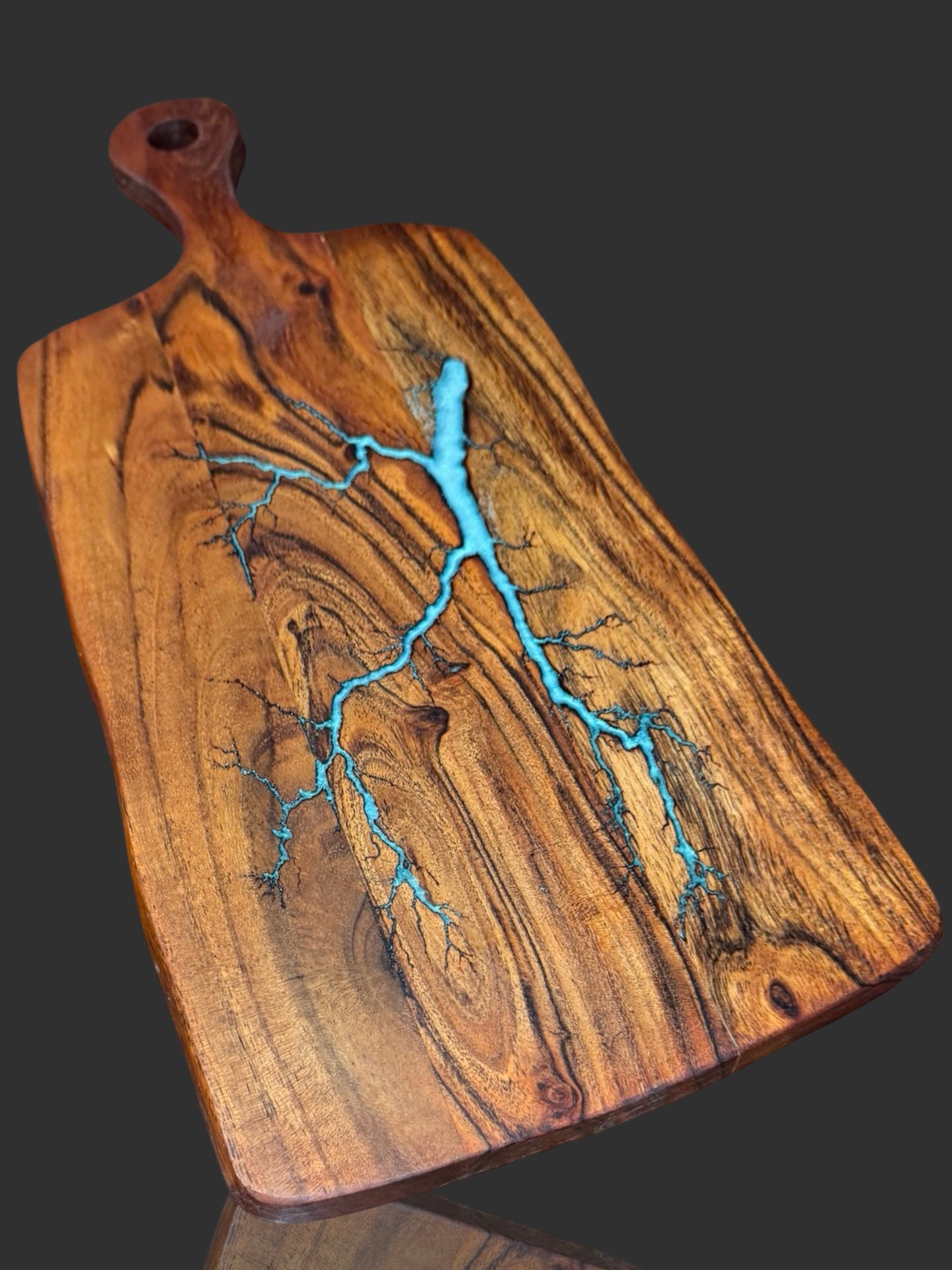 Premium resin cheese paddle crafted from Australian hardwood with vibrant resin inlay. Perfect for cheese, grazing, and charcuterie platters, weddings, and entertaining.