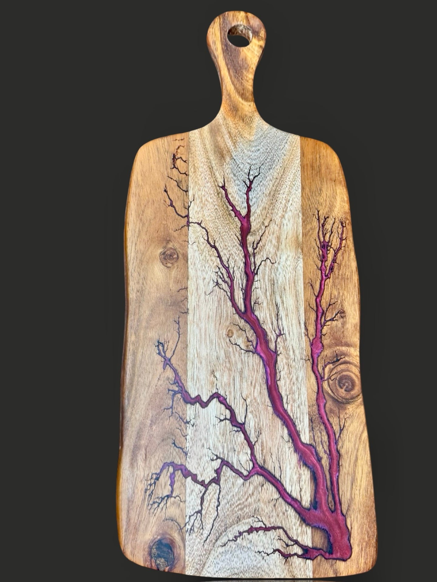 Handmade resin paddle board for cheese lovers. Fractal Flow Designs creates one-of-a-kind serving boards in Bairnsdale, Victoria, shipped across Australia.