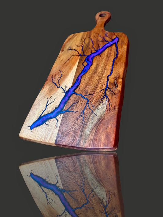 Resin cheese paddle board with handcrafted fractal art design. Created by Fractal Flow Designs in Bairnsdale, Australia, perfect for charcuterie and wedding gifts.