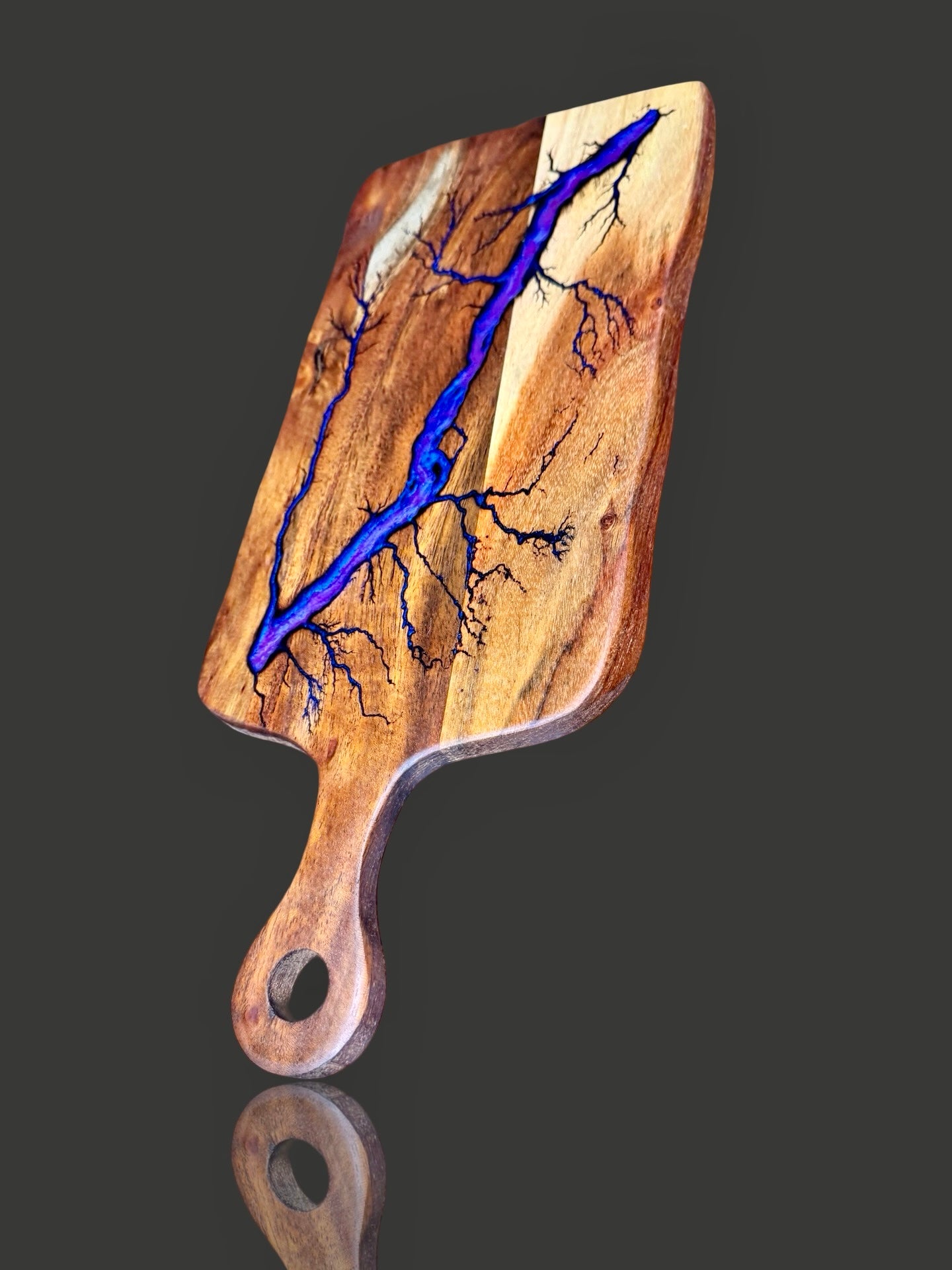 Resin cheese paddle board with handcrafted fractal art design. Created by Fractal Flow Designs in Bairnsdale, Australia, perfect for charcuterie boards and wedding presents.