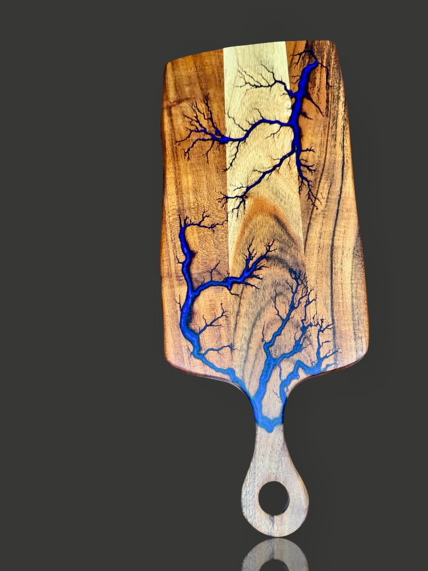 Resin paddle cheese board by Fractal Flow Designs. Unique fractal burning patterns on Australian timber, perfect grazing board for entertaining and gifting.