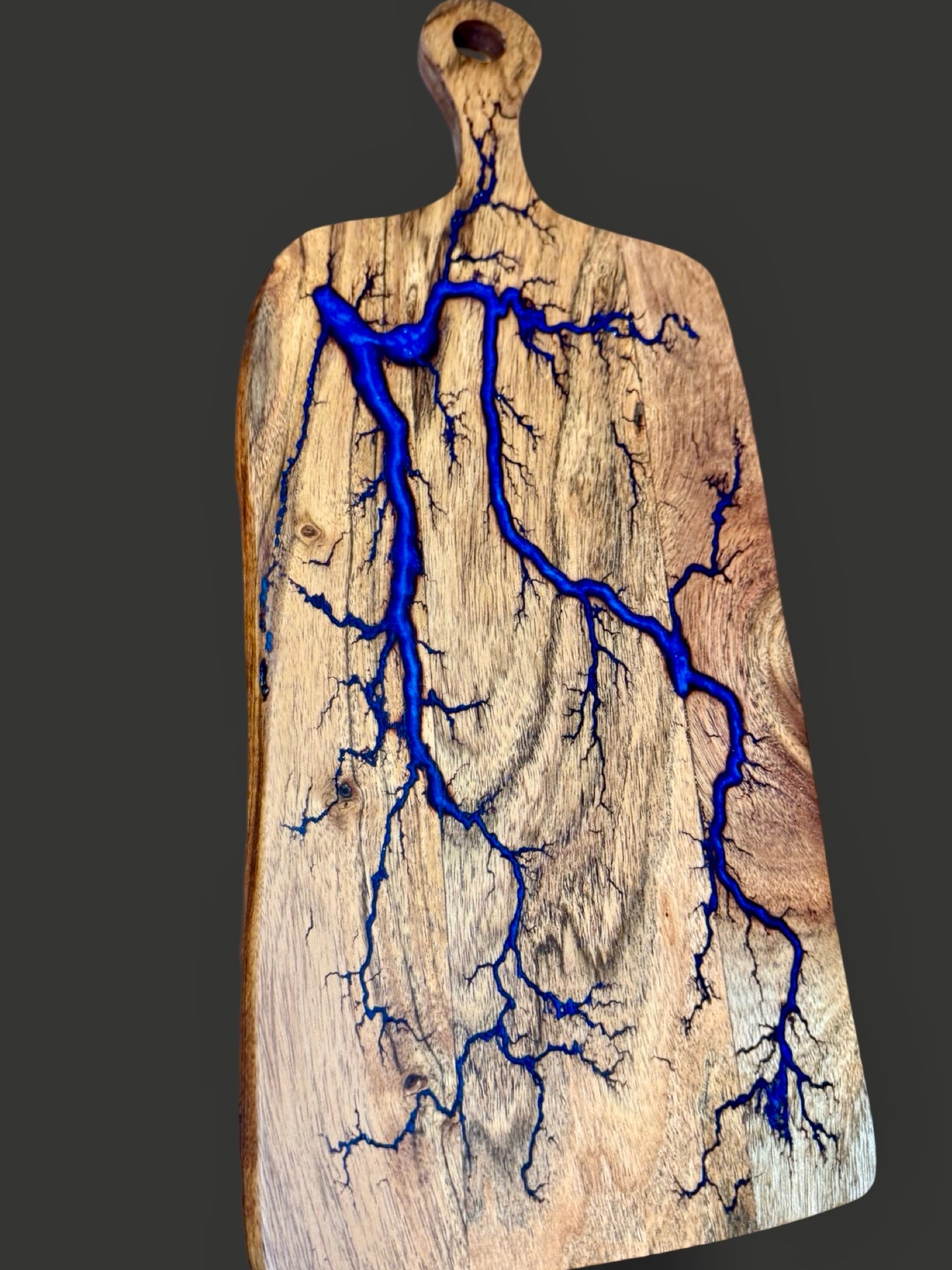 Handcrafted resin cheese paddle board, Australian timber with vibrant resin art. Designed by Fractal Flow Designs for charcuterie, grazing platters, and special gift occasions.