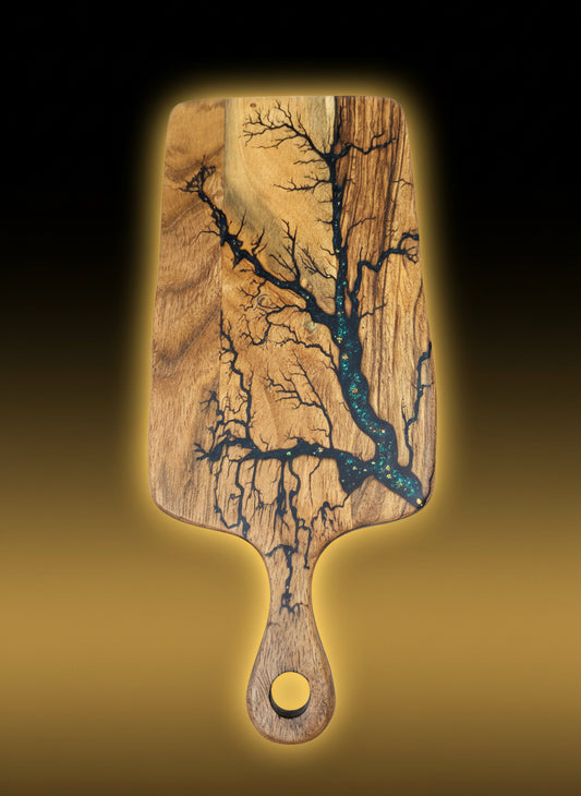 Resin cheese paddle with bold fractal design and resin finish. Handmade in Victoria by Fractal Flow Designs, shipped nationwide for gift occasions and events.