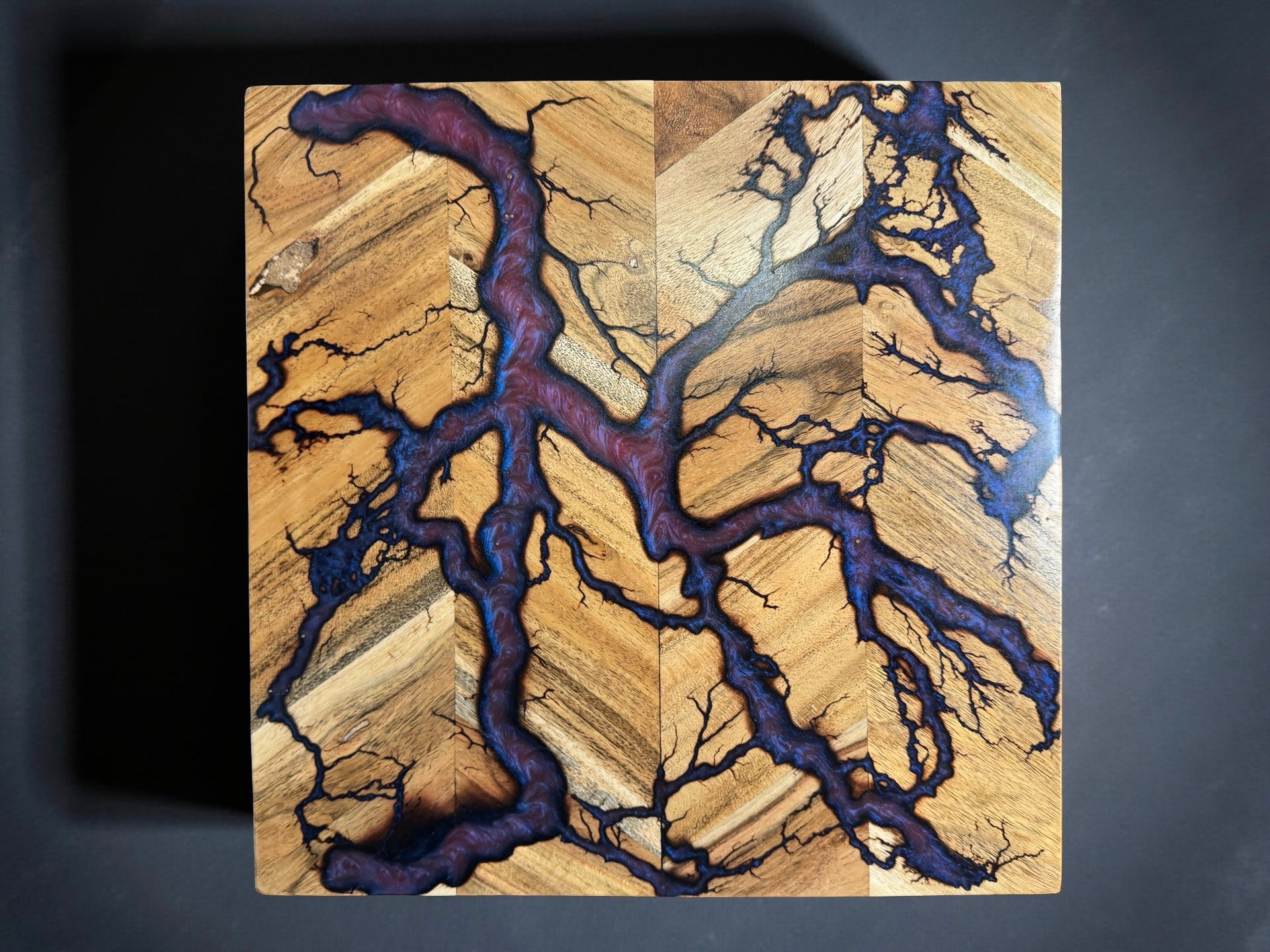 Red green chameleon resin chopping board 320 x 320 with lightning style fractal burning artwork built with sustainably sourced Australian timber crafted in Bairnsdale Australia by Fractal Flow Designs Australia’s resin board brand