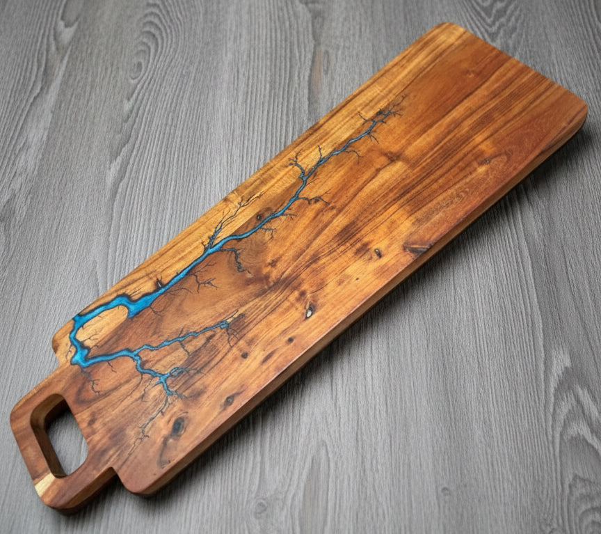 Long resin entertaining board with bold resin artwork resin boards Australia